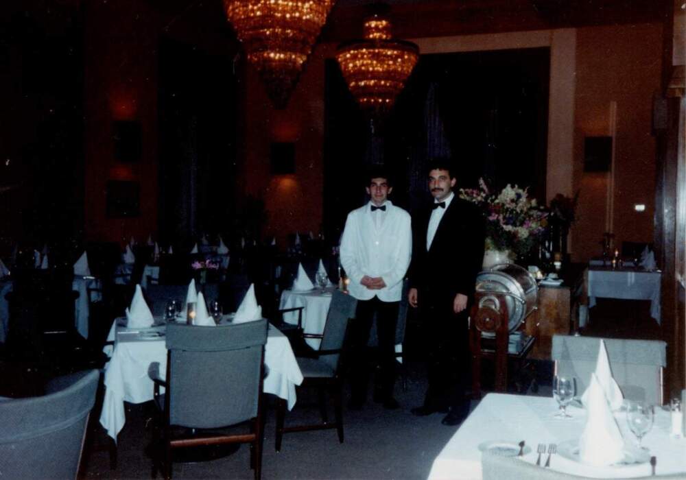 The author, left, with his uncle iat the restaurant where they worked together for a time in 1992. (Courtesy Ismar Volić)