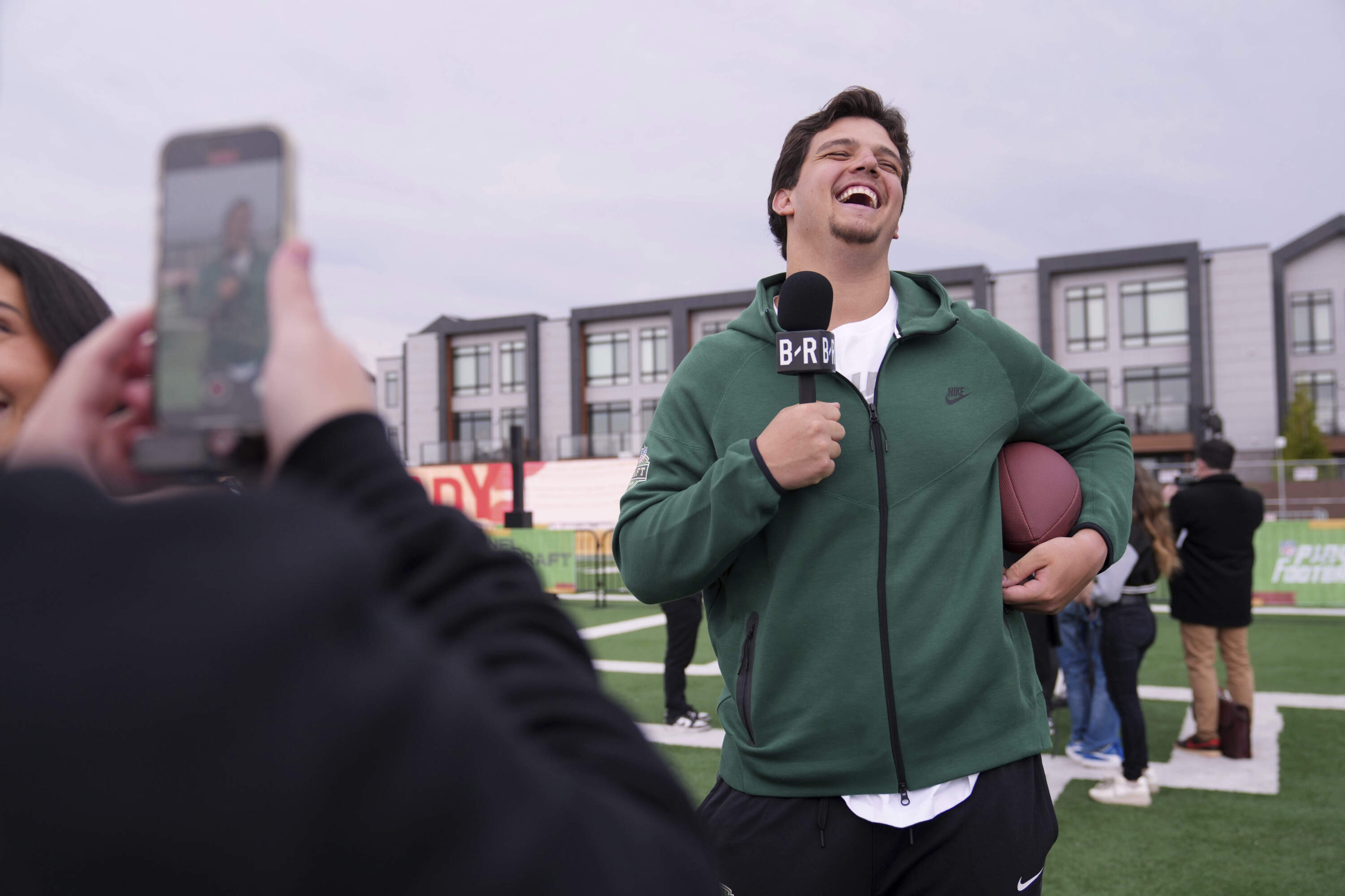 Draft prospect, LSU tackle Will Campbell, laughs as he talks with the media after taking part in the league's annual prospect clinic ahead of the NFL football draft Wednesday, April 23, 2025, in Green Bay, Wis. (AP Photo/Jeff Roberson)