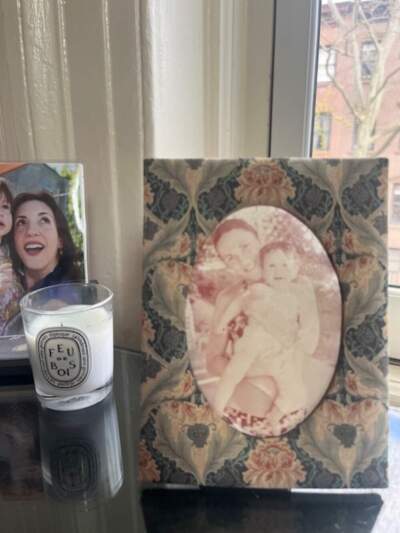 A framed photo of the author's mother, and the author as a baby. (Courtesy Nicola Kraus)