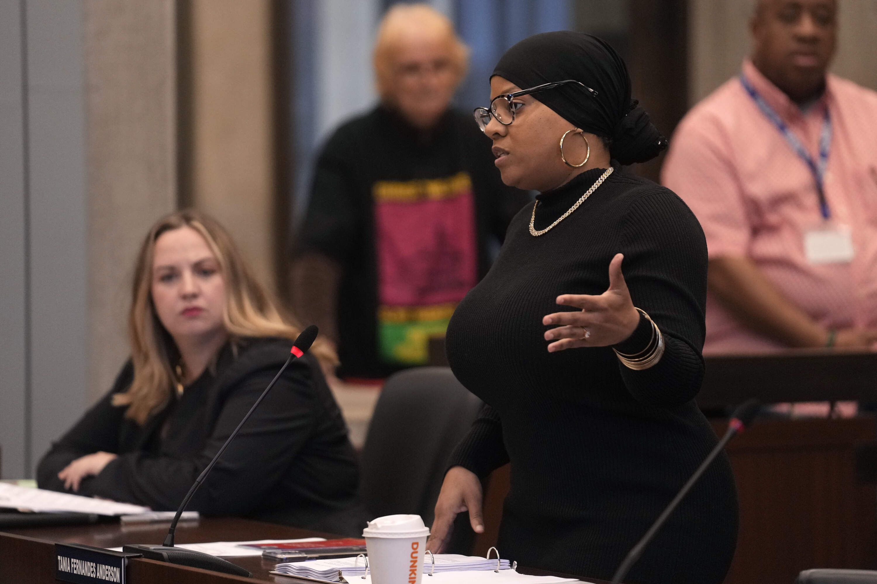 Boston City Councilor Tania Fernandes Anderson speaks as fellow Councilor Sharon Durkan looks on during a 2023 meeting at City Hall. (Steven Senne/AP)
