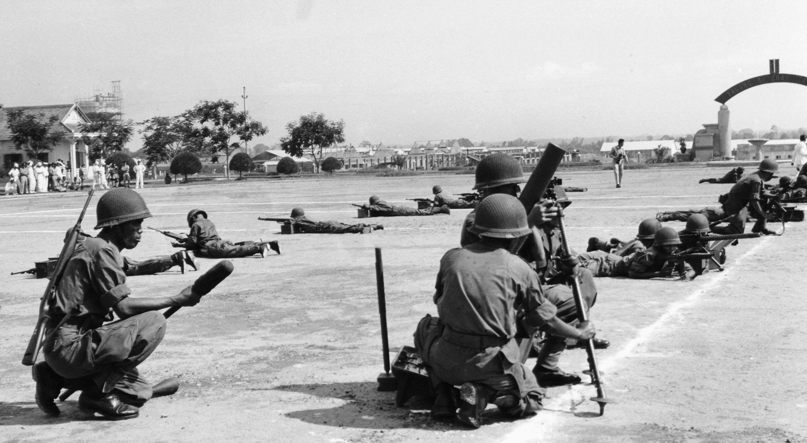 South Vietnamese troops train with U.S. weapons in South Vietnam on June 20, 1955. (Fred Waters/AP)