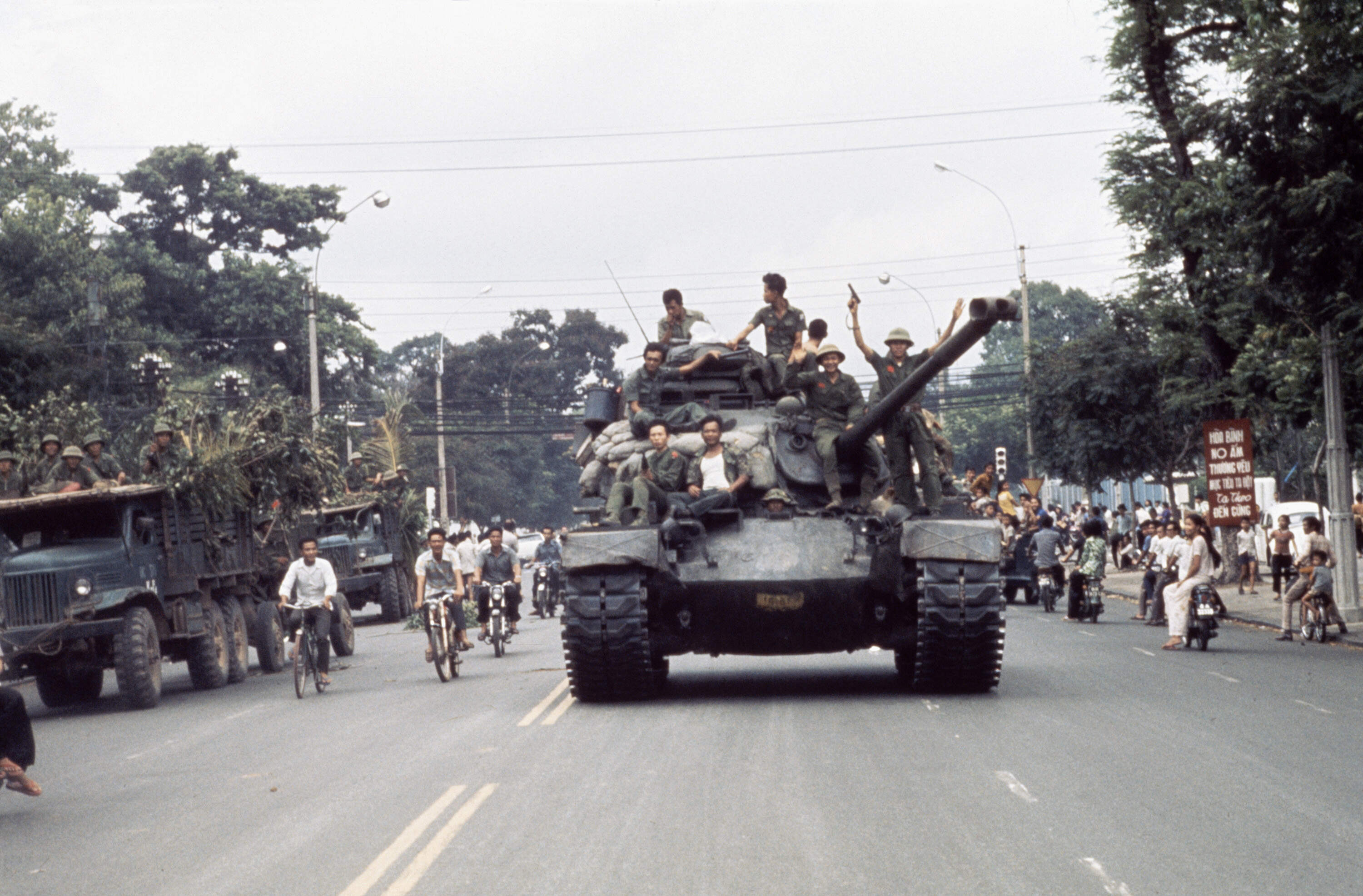 North Vietnamese troops enter Saigon on tanks and trucks on April 30, 1975. (Jacques Pavlovsky/Sygma/CORBIS/Sygma via Getty Images)