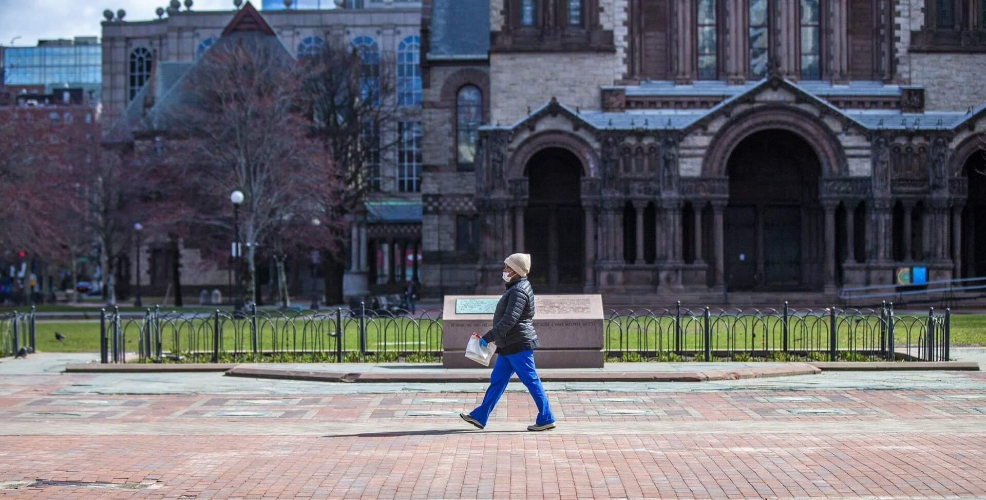 A woman through a Copley Square in 2020. (Jesse Costa/WBUR)