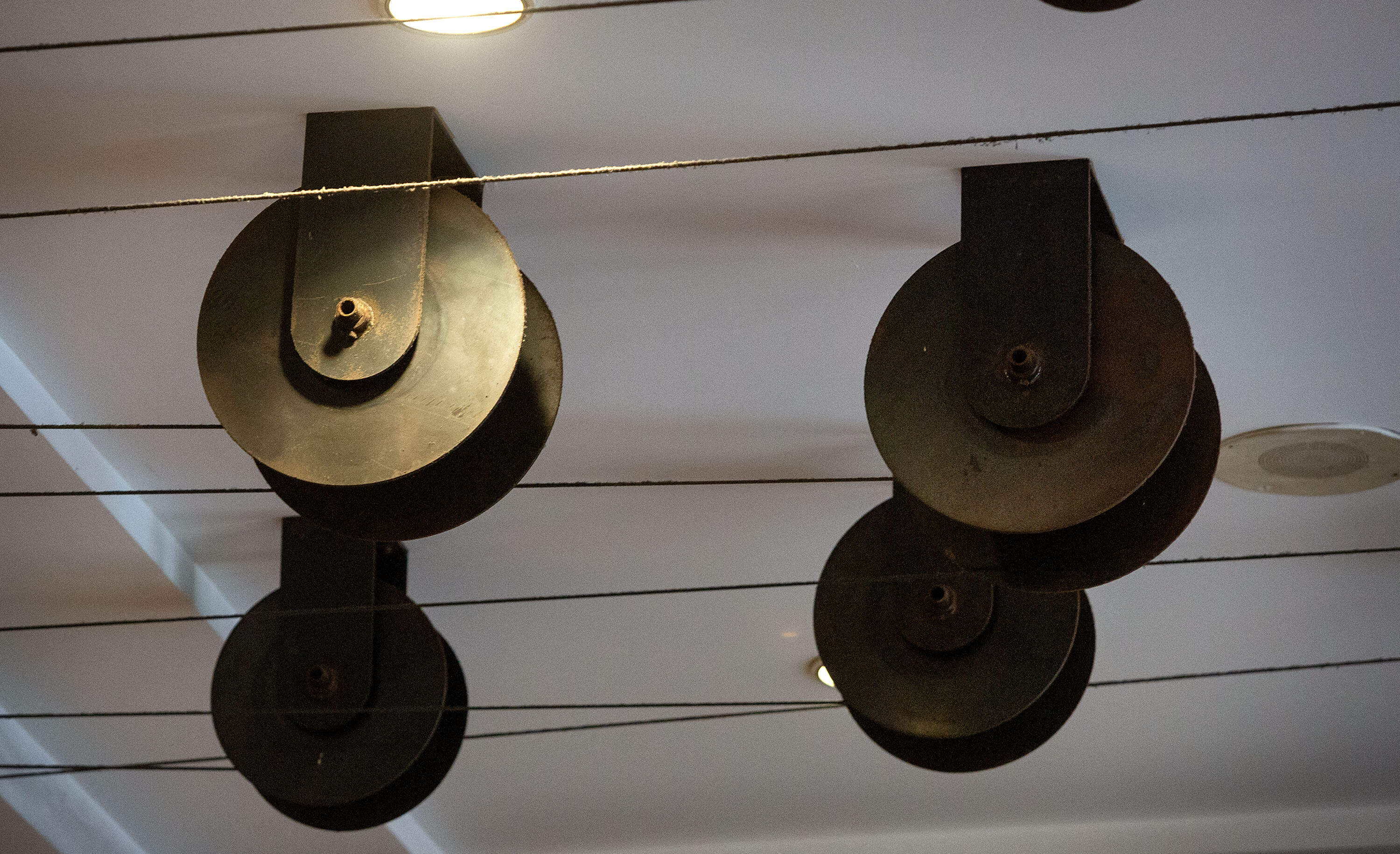 The pulleys attached to the ceiling inside the entrance of Boston's South Station are part of Schiff's installation. (Robin Lubbock/WBUR)