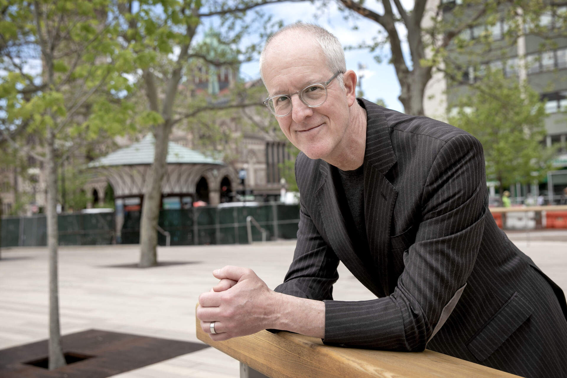 Urban designer Jeff Speck looks over the new Copley Square renovation. (Robin Lubbock/WBUR)