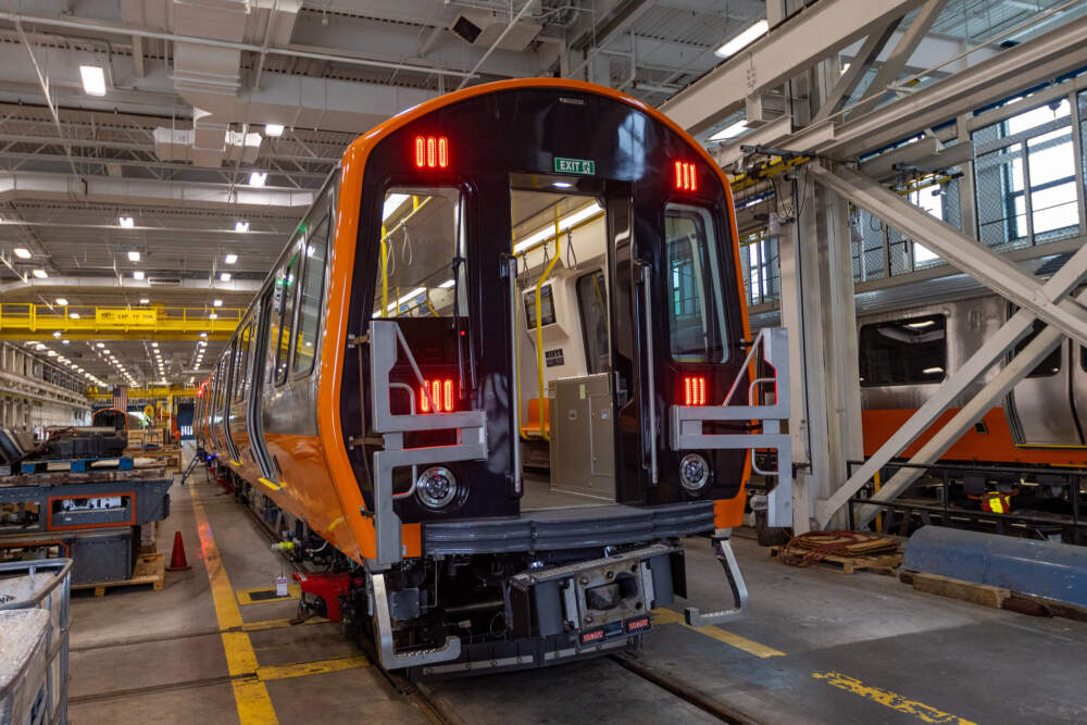 A brand-new Orange Line car being tested at the Wellington Train Yard in Medford. (Jesse Costa/WBUR)