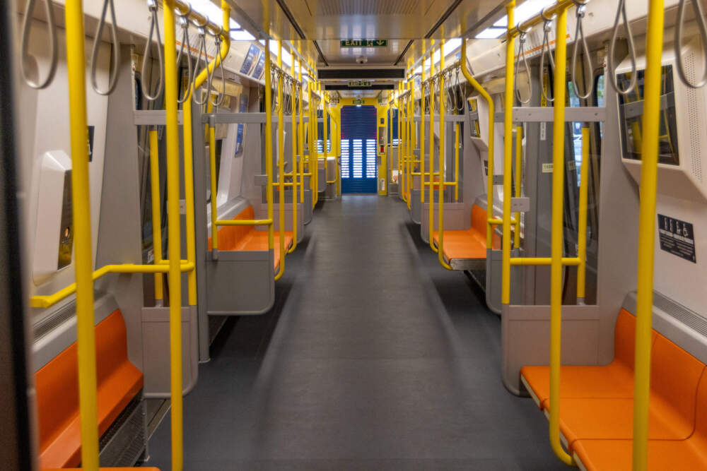 The insides of the New Orangee Line Cars The Wellington Train Yard in MedSFord. (Esse costa / wbur)