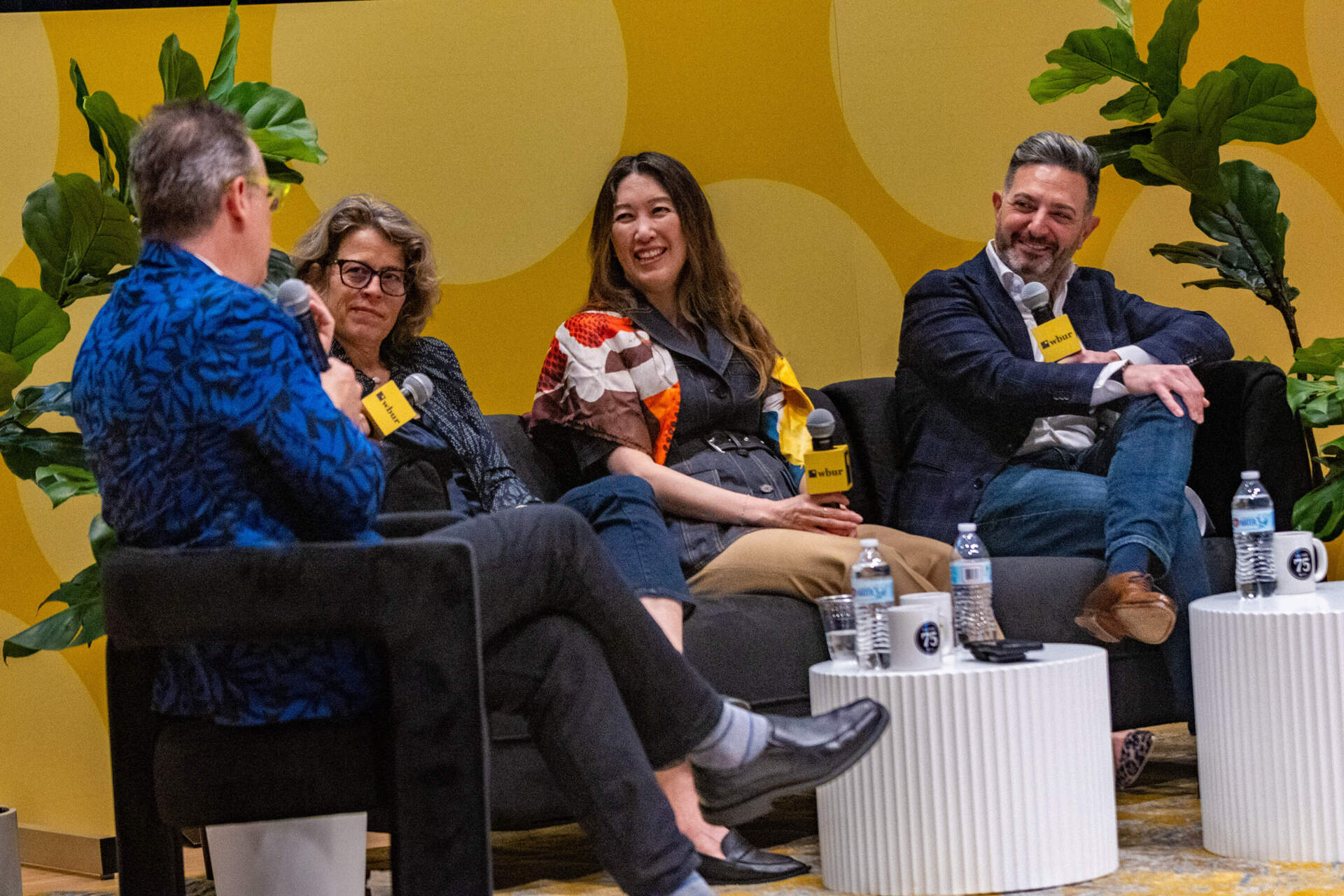 Journalist Scott Kirsner, Katie Rae, Julie Kim and Avak Kahvejian on stage during the &quot;Future of Innovation in Massachusetts&quot; session at The WBUR Festival. (Jesse Costa/WBUR)