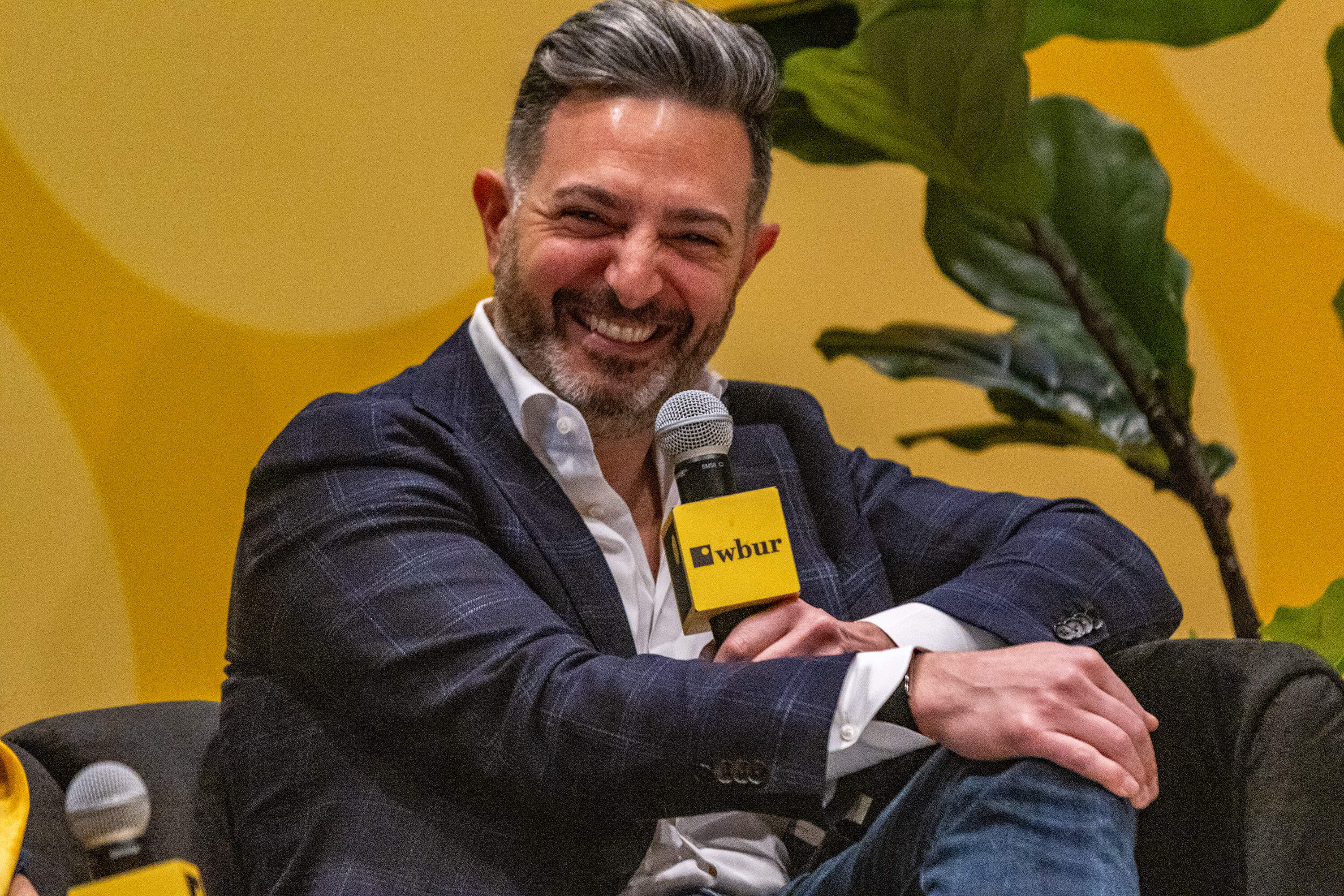 General Partner of Flagship Pioneering Avak Kahvejian on stage during the "Future of Innovation in Massachusetts" session at The WBUR Festival. (Jesse Costa/WBUR)