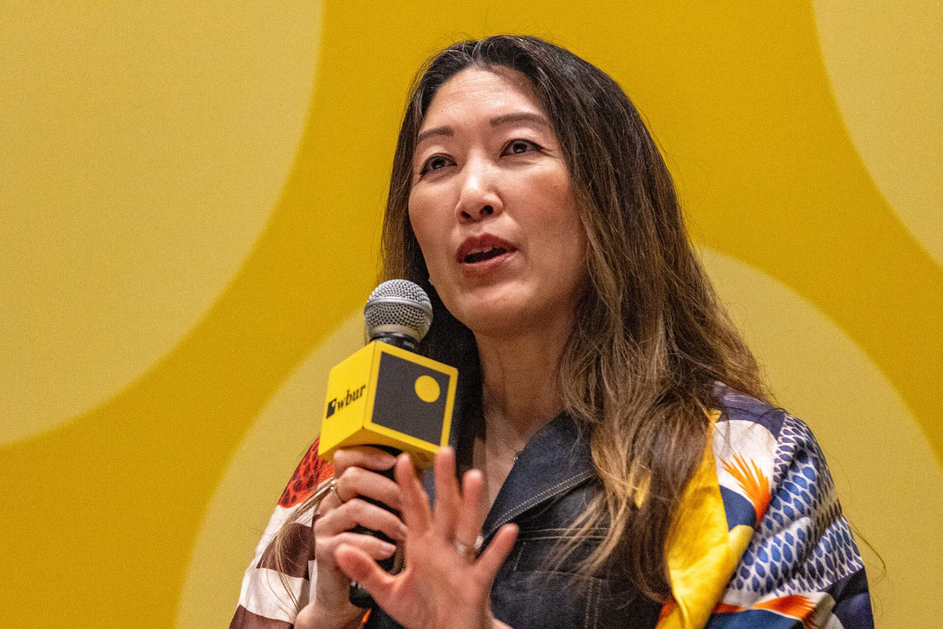 President of Takeda's U.S. Business Unit Julie Kim speaks during the &quot;Future of Innovation in Massachusetts&quot; session at The WBUR Festival. (Jesse Costa/WBUR)