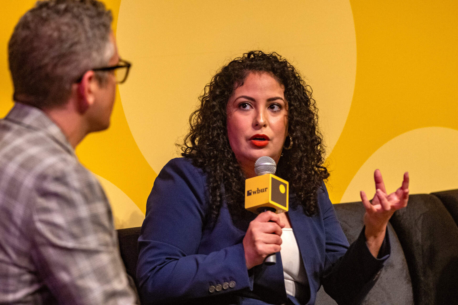 Andrea Flores, vice president for Immigration Policy and Campaigns at FWD.us, speaks during &quot;A New Era for Immigrants and Immigration&quot; session at The WBUR Festival on Saturday. (Jesse Costa/WBUR)