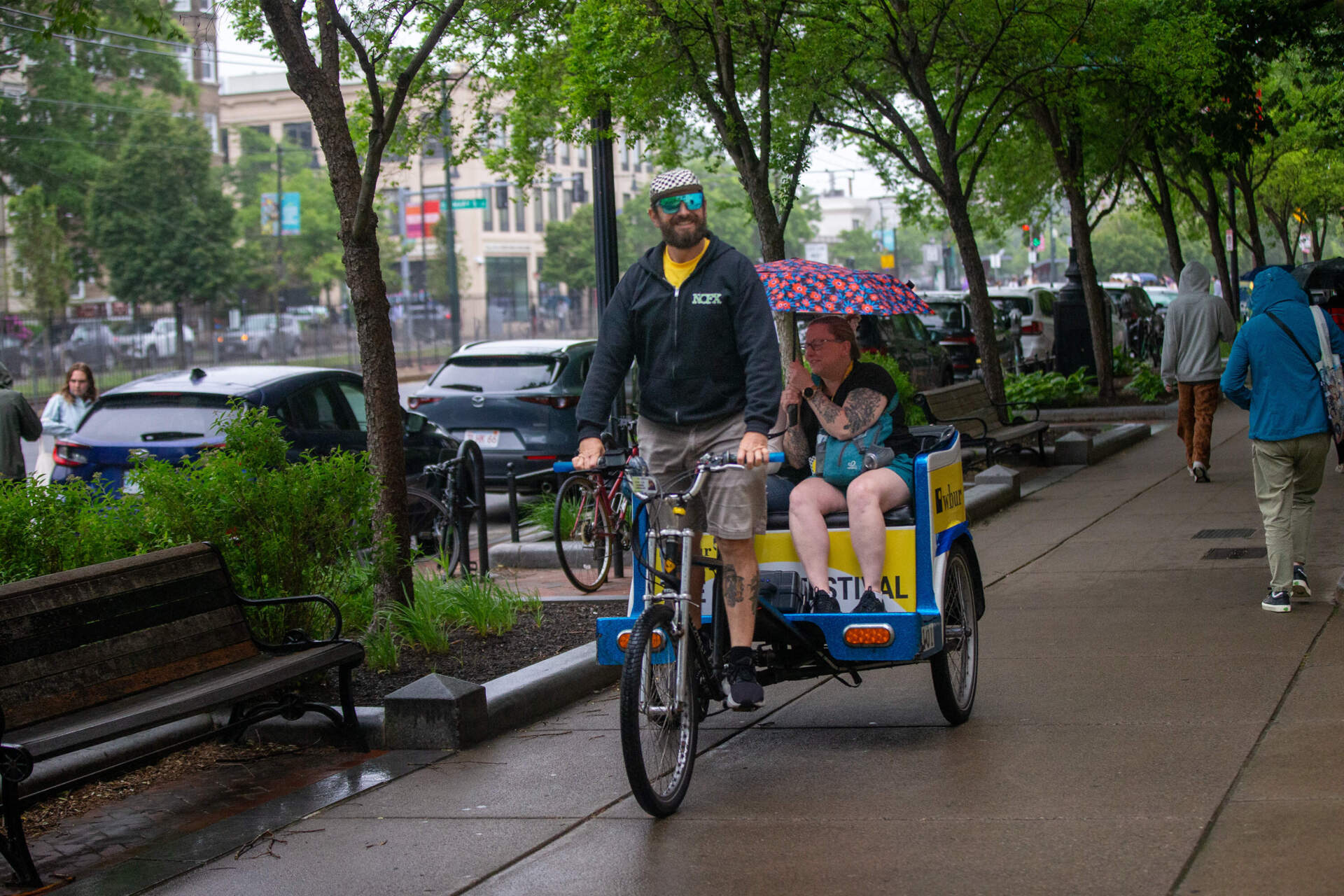 Some festival goers hopped in pedicabs to get around Commonwealth Avenue for The WBUR Festival. (Jesse Costa/WBUR)