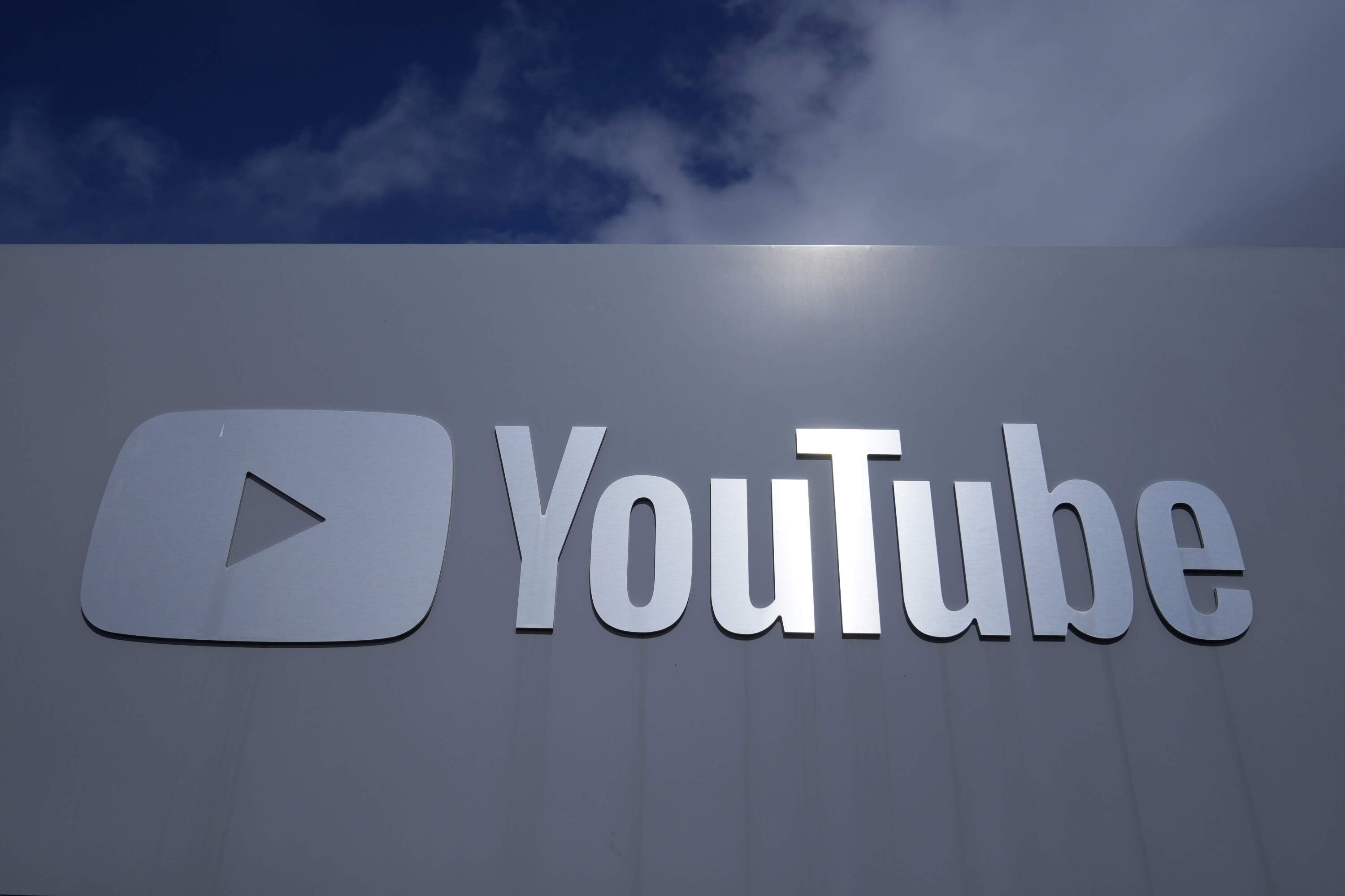 A YouTube sign is shown near the company's headquarters in San Bruno, California. (/Jeff Chiu/AP)