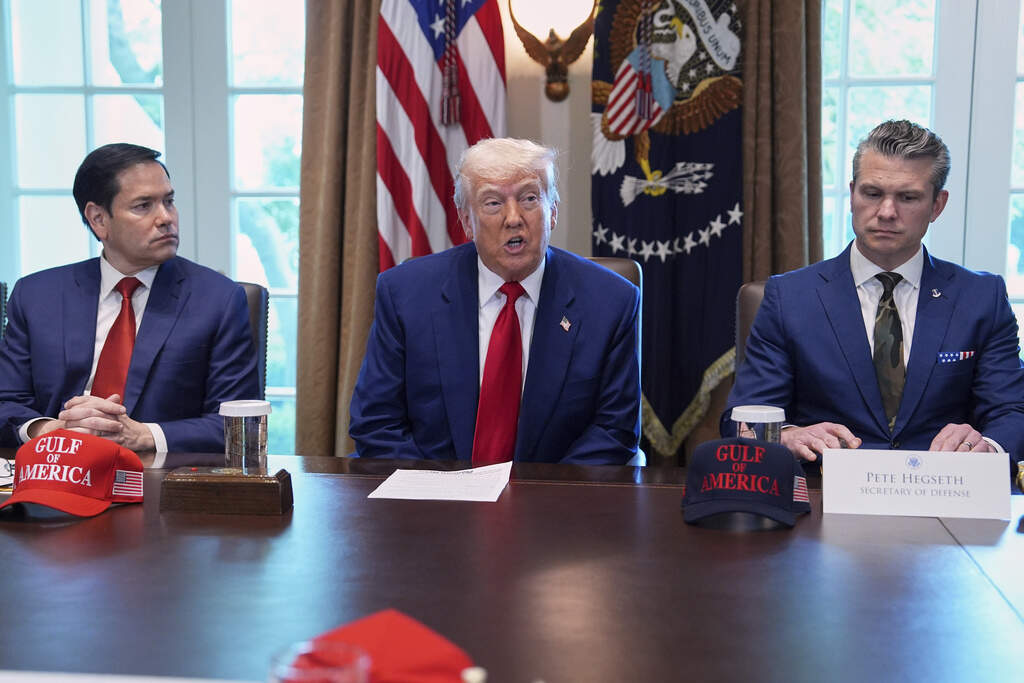 President Donald Trump speaks during a cabinet meeting at the White House, Wednesday, April 30, 2025, in Washington, as Secretary of State Marco Rubio, left, and Secretary of Defense Pete Hegseth, look on. (Evan Vucci/AP)