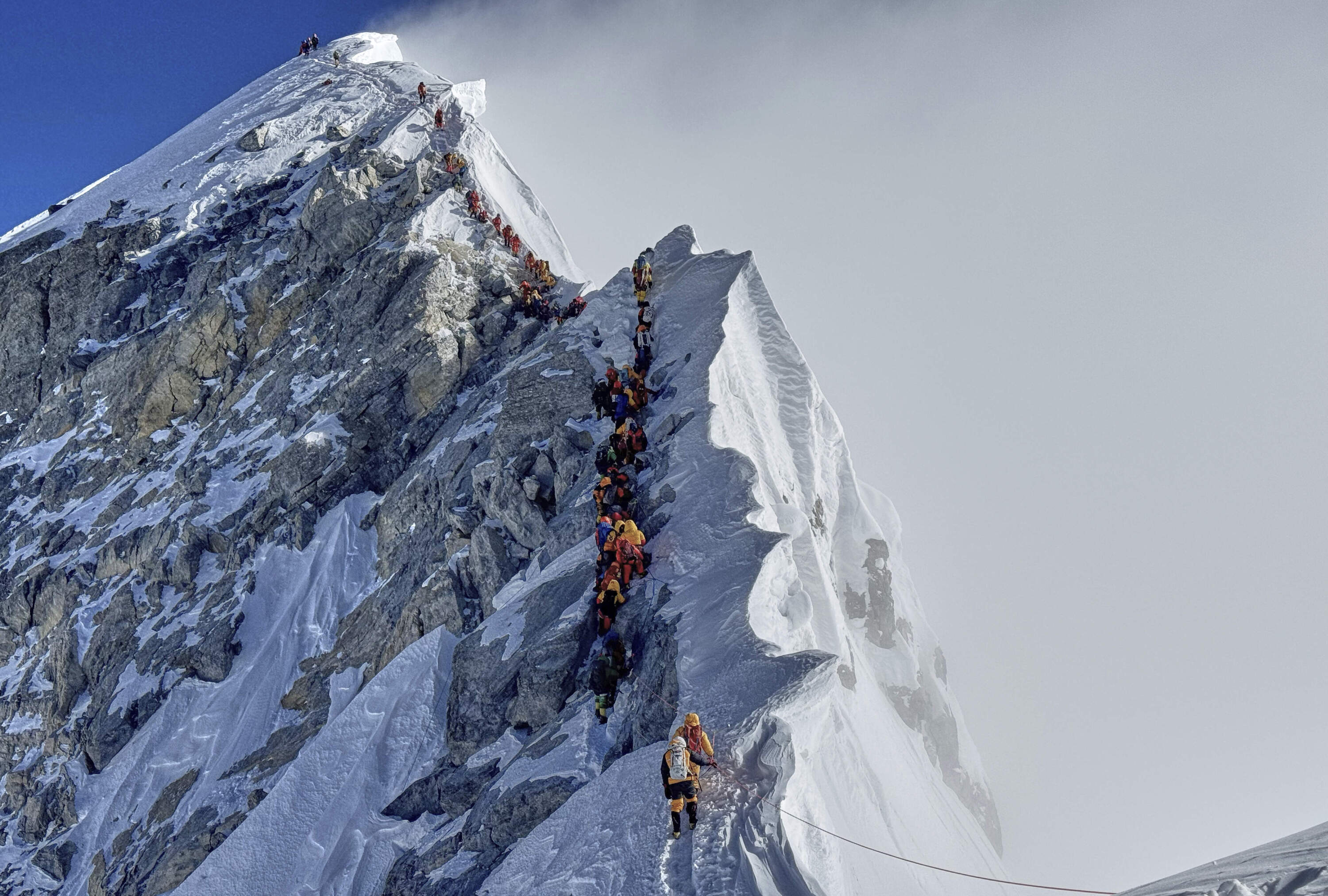 Mountaineers form a queue as they approach the summit of Mount Everest in Nepal, May 18, 2025. (Kunga Sherpa/AP)