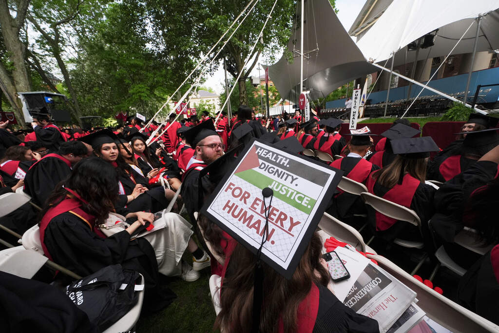 Graduating students attend commencement ceremonies at Harvard University. (Charles Krupa/AP)