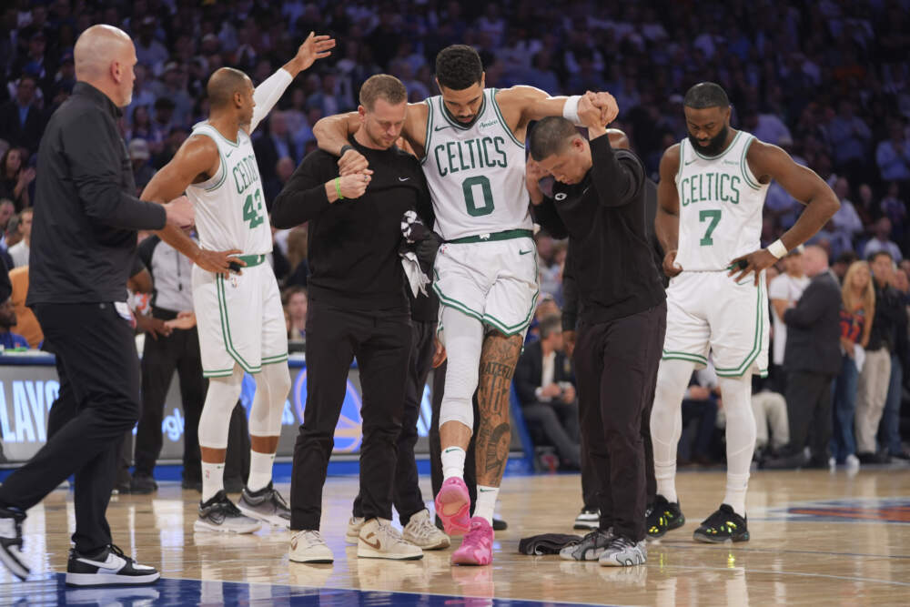 Trainers help Boston Celtics' Jayson Tatum off the court after he was injured during the second half of Game 4 in the Eastern Conference semifinals Monday, May 12, 2025, in New York. (Frank Franklin II/AP)