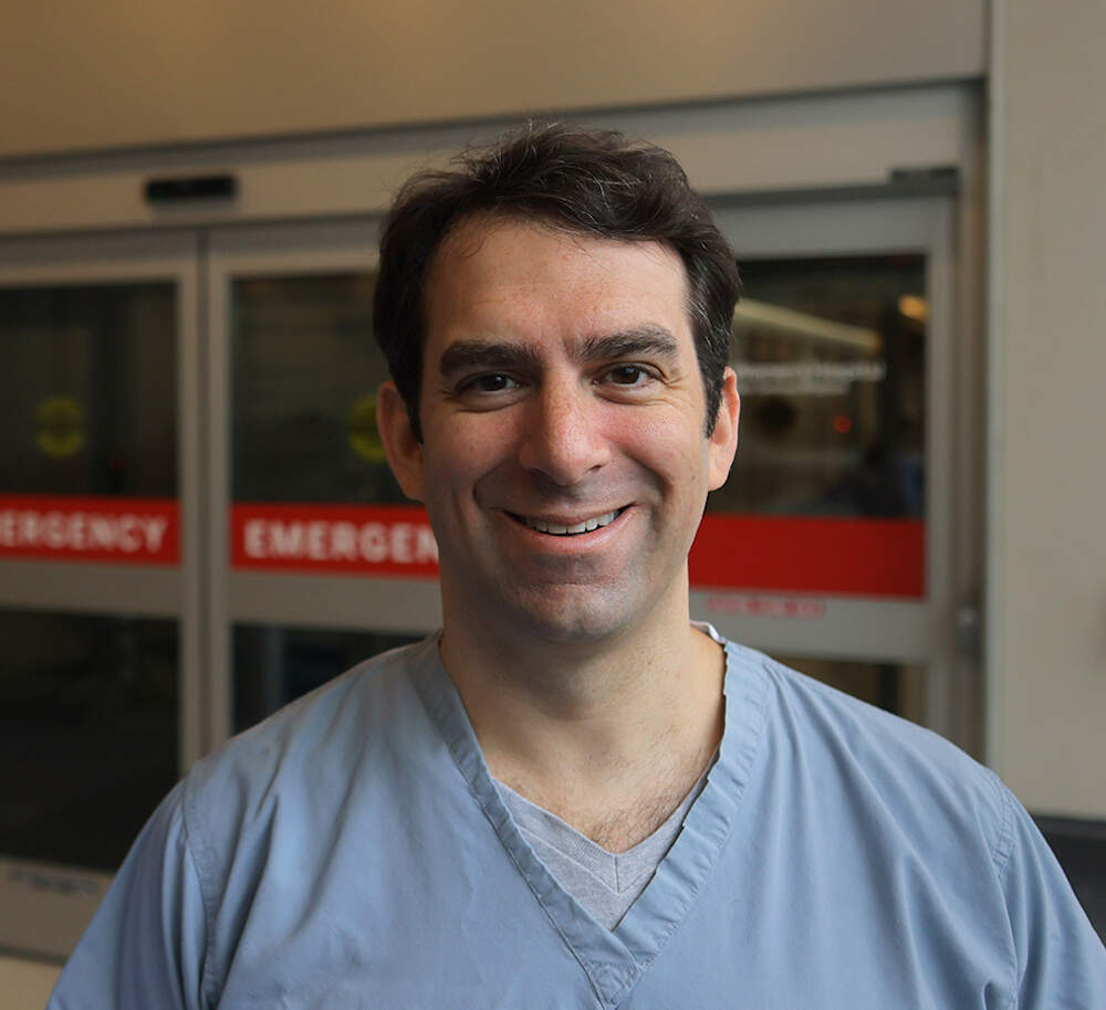 Dr. Jeremy Faust outside the Brigham and Woman's hospital. (Lane Turner/The Boston Globe through Getty Images)