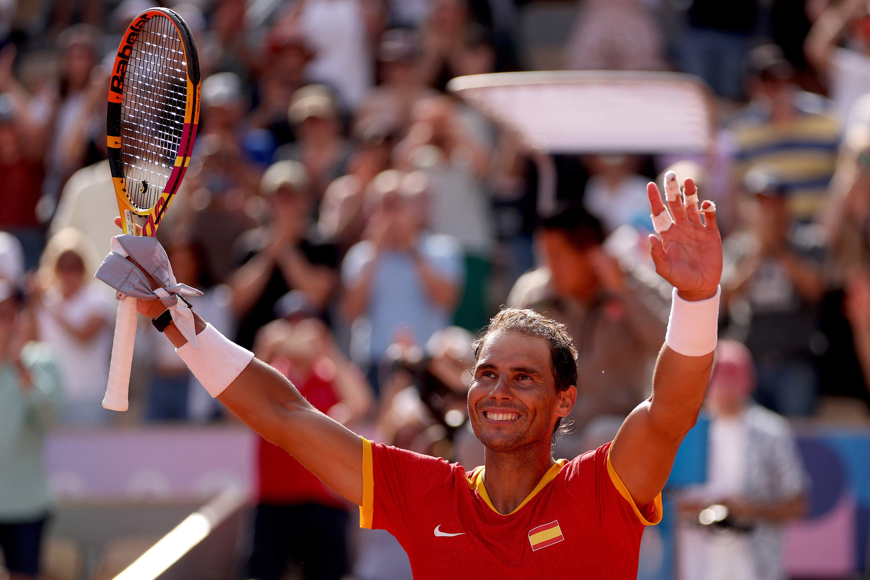 Rafael Nadal of Team Spain celebrates after winning match point against Marton Fucsovics of Team Hungary during the Men’s Singles first round match on day two of the Olympic Games Paris 2024 at Roland Garros on July 28, 2024 in Paris, France. (Clive Brunskill/Getty Images)