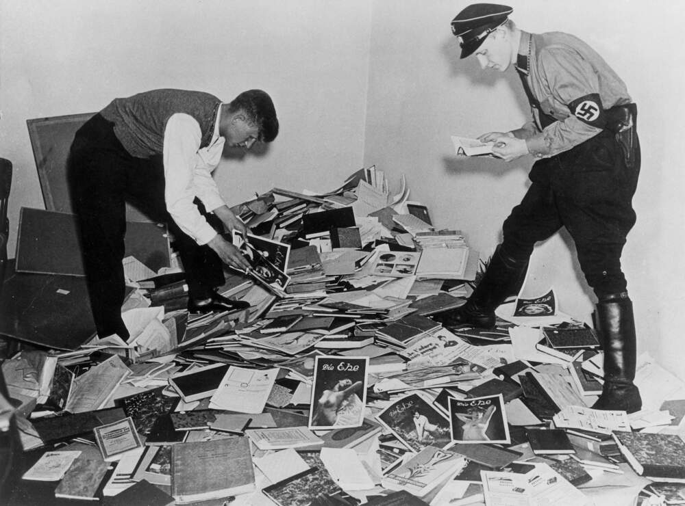 Students of the National Socialist Student Association (NSStB) confiscating books from the Institute for Sexual Research Library. (ullstein bild/ullstein bild via Getty Images)