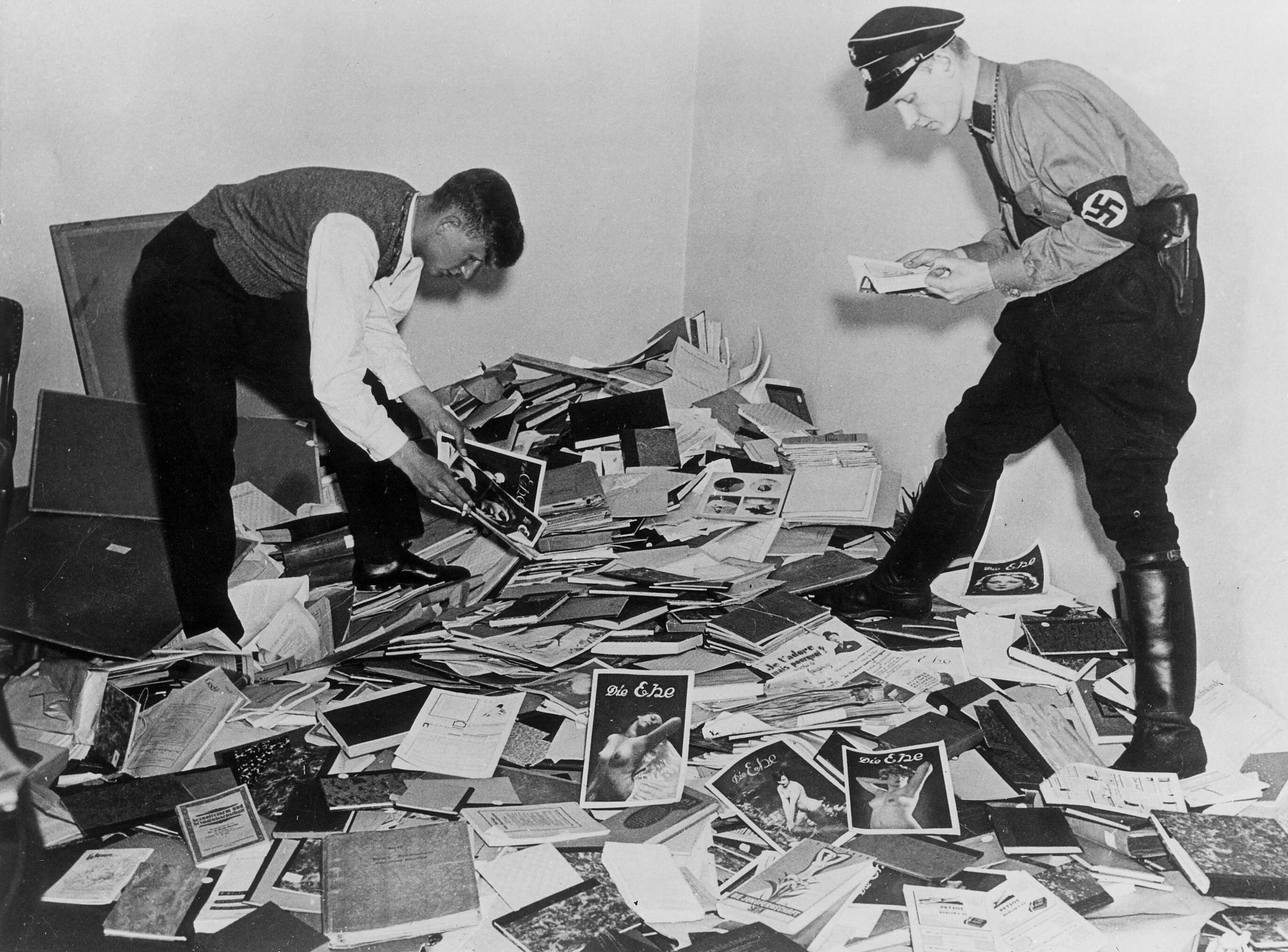 Students of the National Socialist Student Association (NSStB) confiscating books from the Institute for Sexual Research Library. (ullstein bild/ullstein bild via Getty Images)
