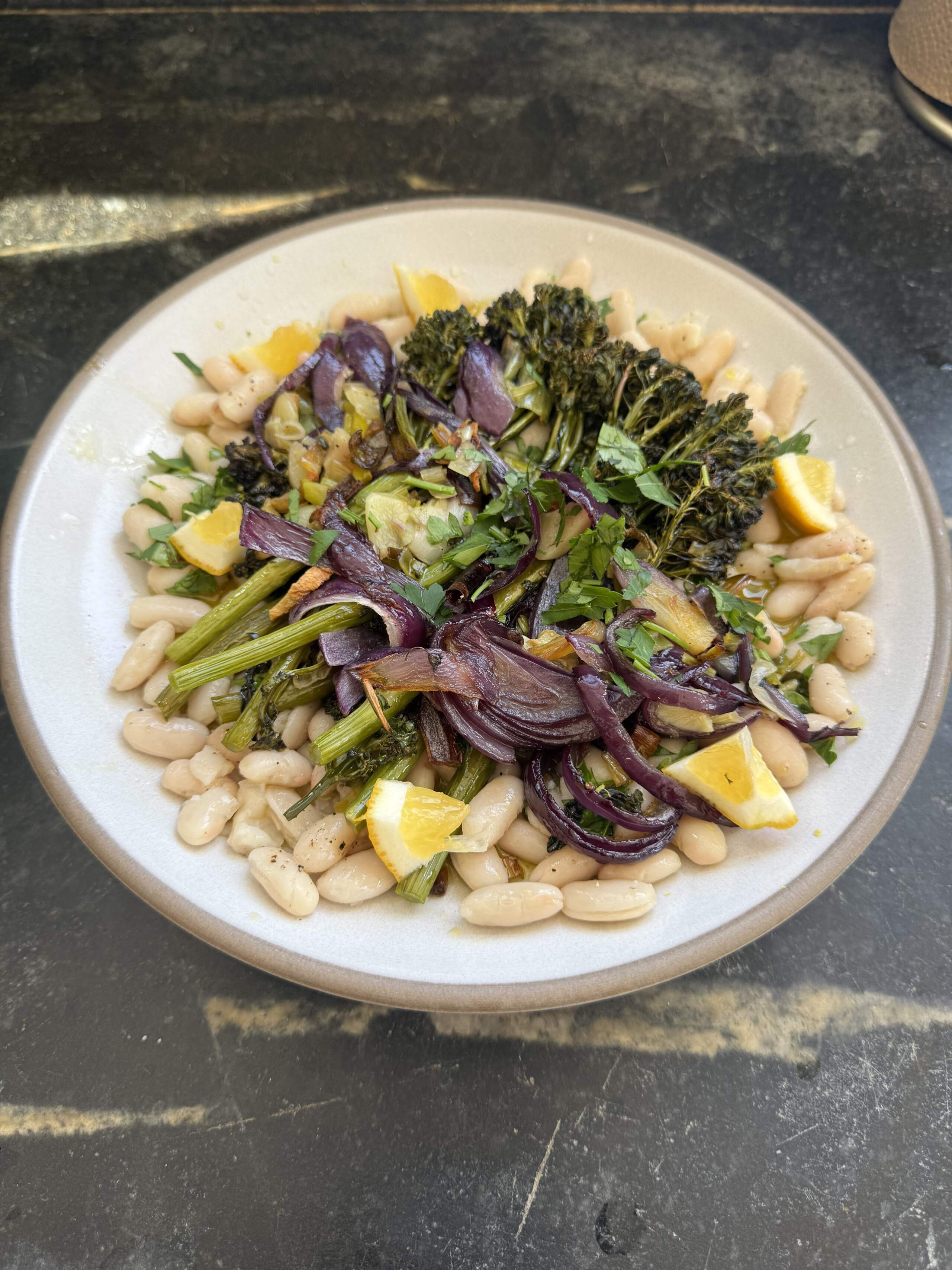 White beans with roasted broccolini, lemon and red onions. (Kathy Gunst/Here & Now)