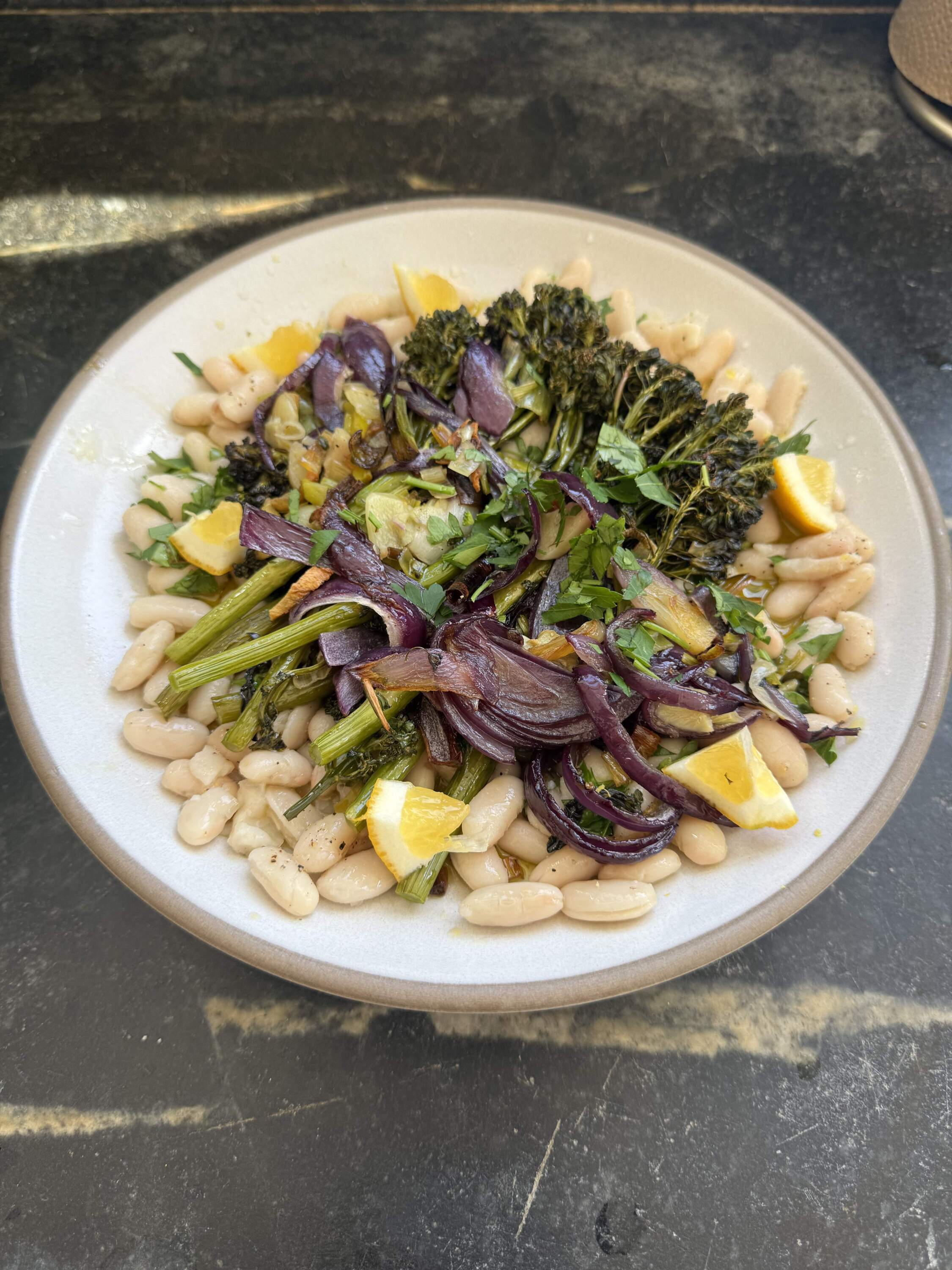 White beans with roasted broccolini, lemon and red onions. (Kathy Gunst/Here & Now)