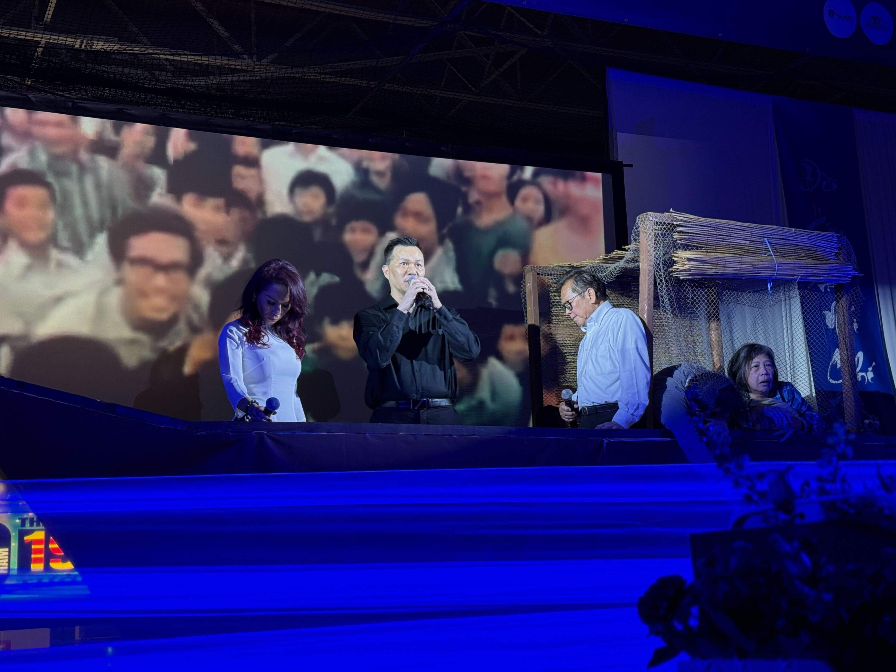 In one poignant moment, singers paid their respects to boat refugees who escaped Vietnam by sea. (Cristela Guerra/WBUR)
