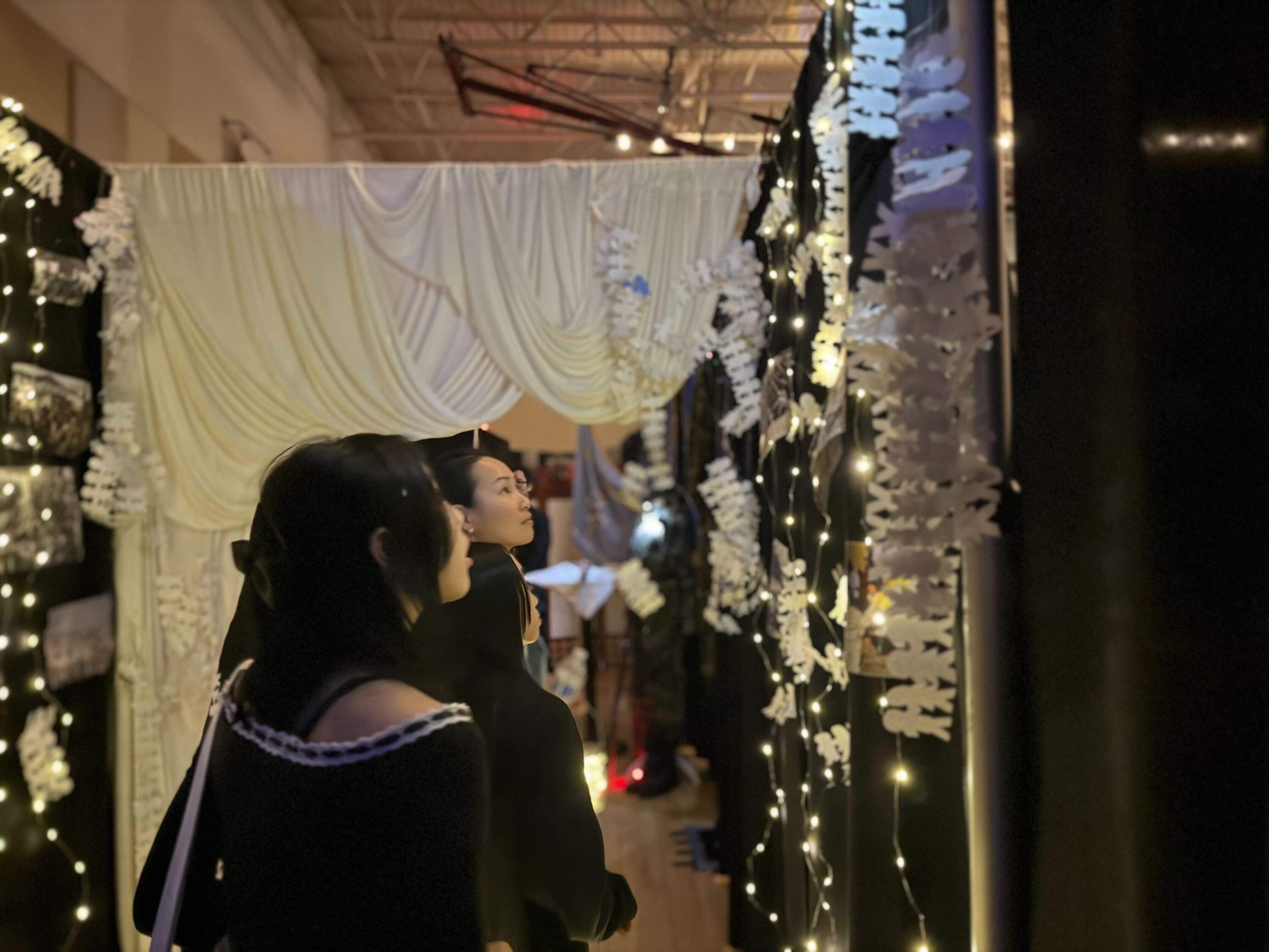 Aspects of the immersive exhibition posed questions such as, “What does it mean to maintain dignity in exile?” And “what do you carry with you when you don’t know where you’re going or if you’ll survive?” (Cristela Guerra/WBUR)