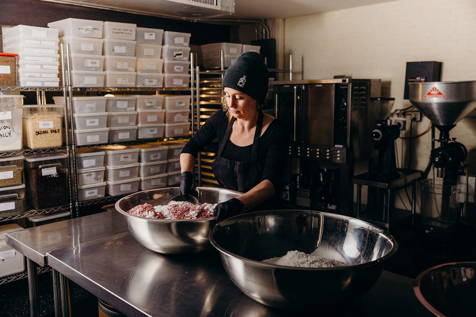 Curio Spice Co. owner Claire Cheney shown in the manufacturing facility of her shop in Cambridge. (Credit: Joanna Chattman / Chattman Photography)