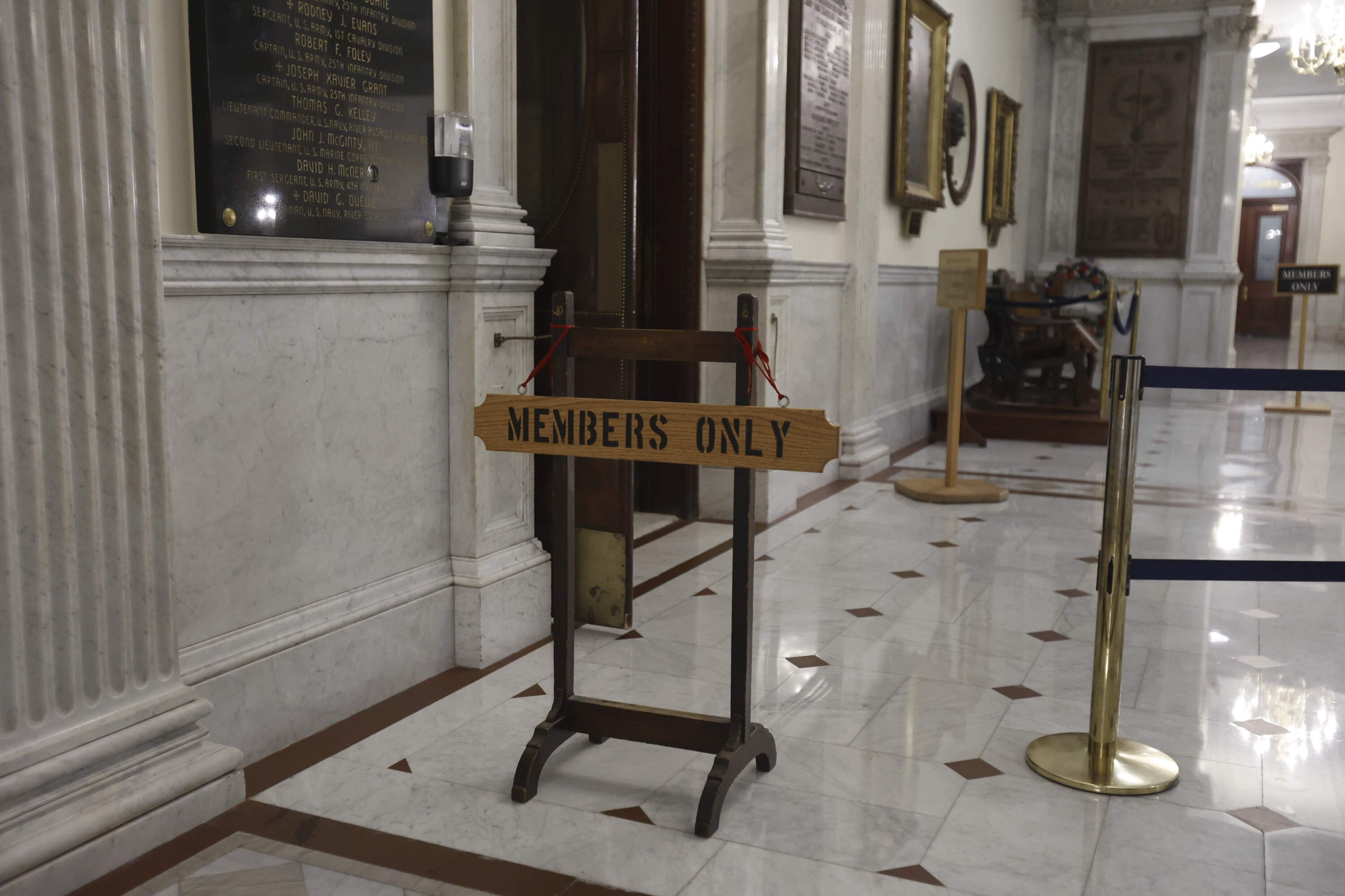 A sign blocks access to the public at the entrance to the House of Representatives at the Massachusetts State House in 2024. (Mary Schwalm/AP)