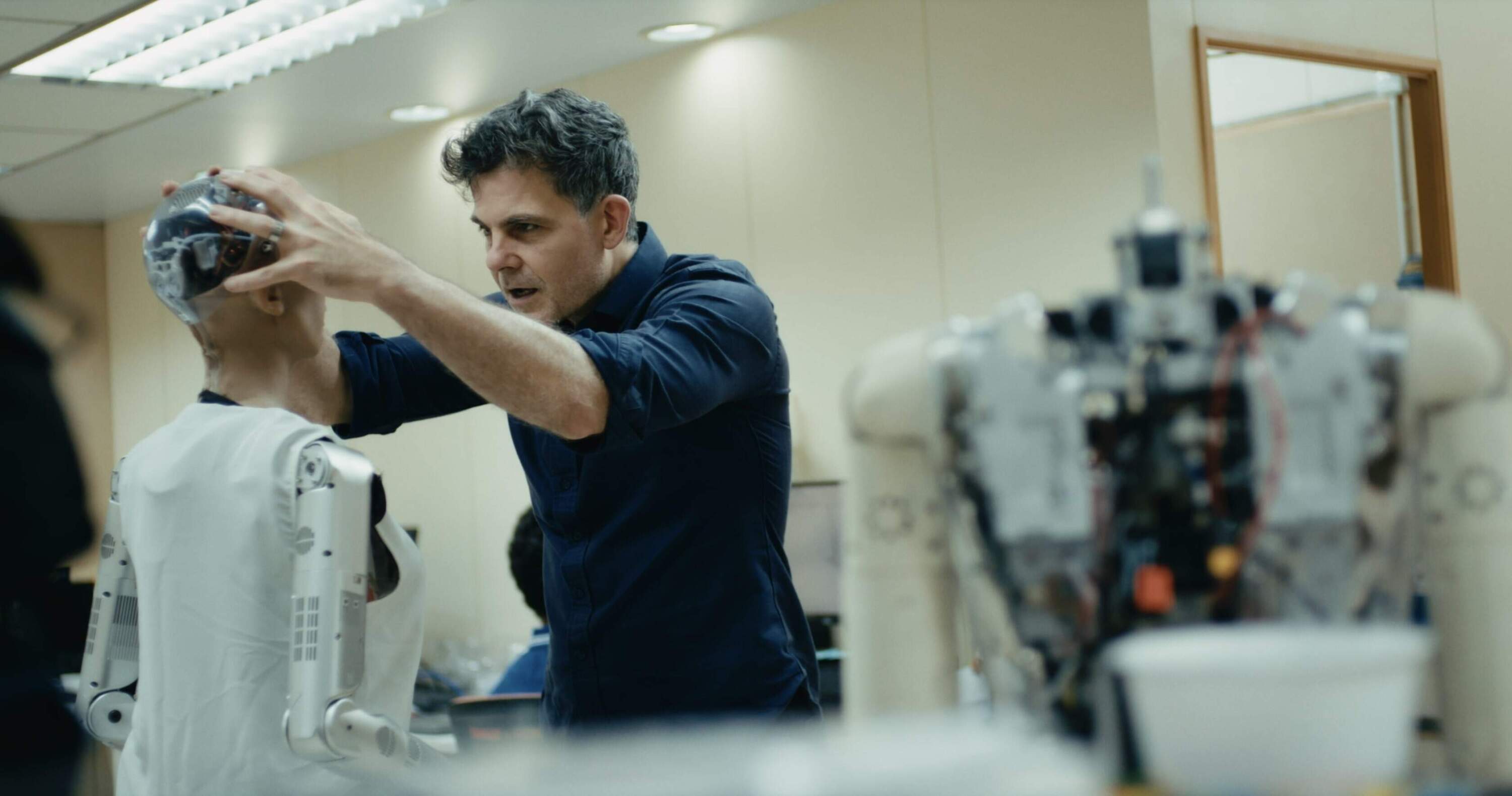 David Hanson works on Sophia, a human-like robot. (Courtesy Gravitas Ventures)