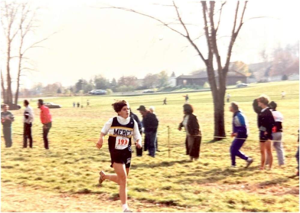 The author running cross country as a high school athlete. (Courtesy Meaghan Shields)