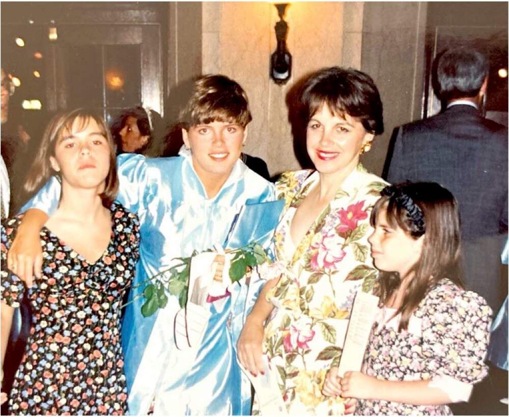 The author with her mother and sisters at her high school graudation. (Courtesy Meaghan Shields)