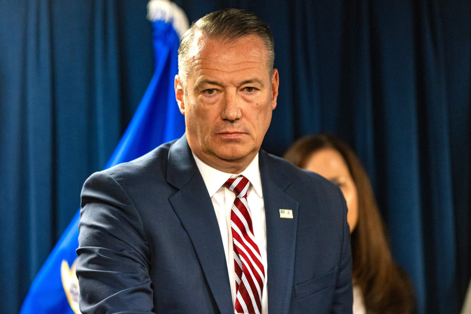 Acting ICE Director Todd Lyons answers questions during a press conference to talk about the month-long immigration enforcement surge in Massachusetts. (Jesse Costa/WBUR)