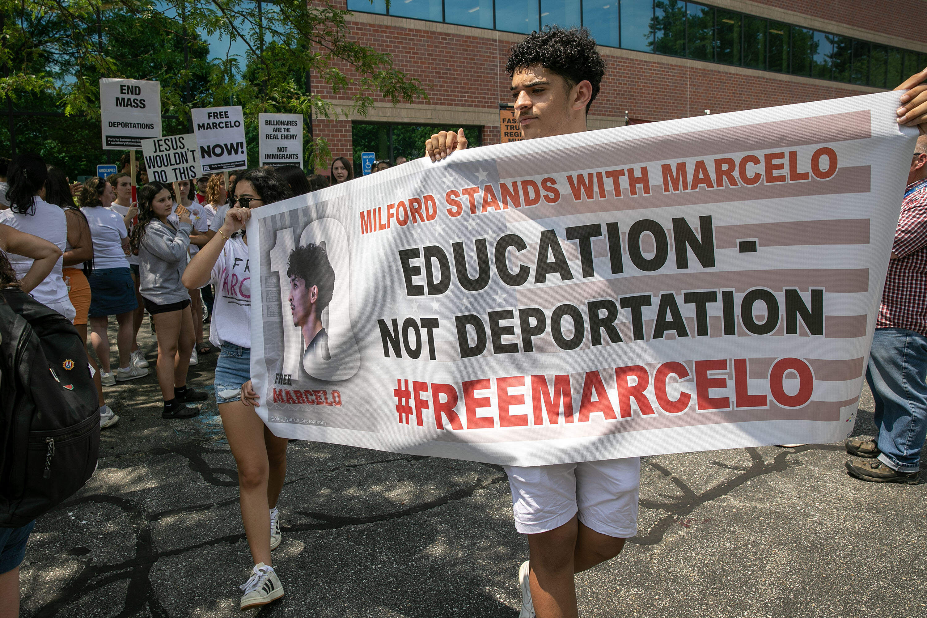 Outside the Chelmsford Immigration Court on Thursday, protesters called for the release of Marcelo Gomes Da Silva. (Robin Lubbock/WBUR)