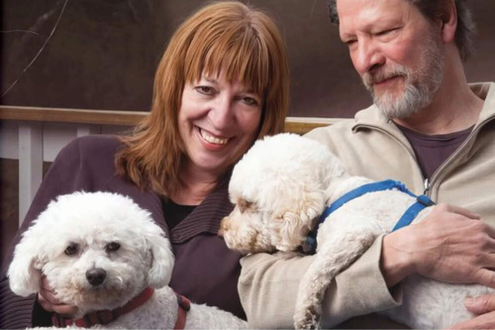 Actors Marianne Leone and Chris Cooper with two of their dogs. 