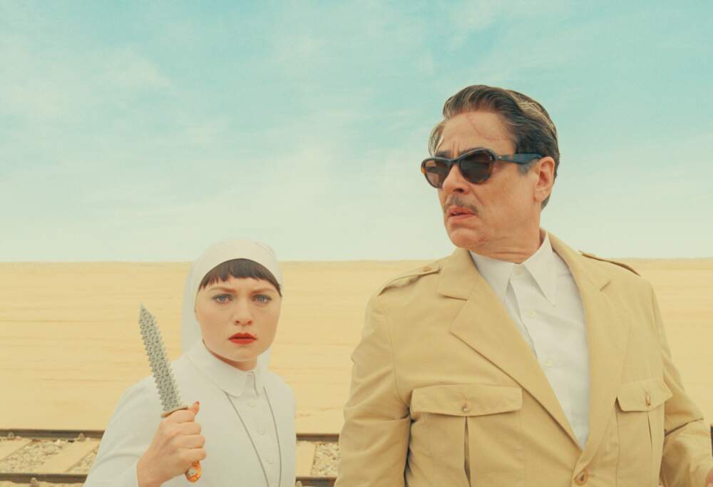 From left: Mia Threapleton and Benicio Del Toro in director Wes Anderson's "The Phoenician Scheme." (Courtesy of TPS Productions/Focus Features)