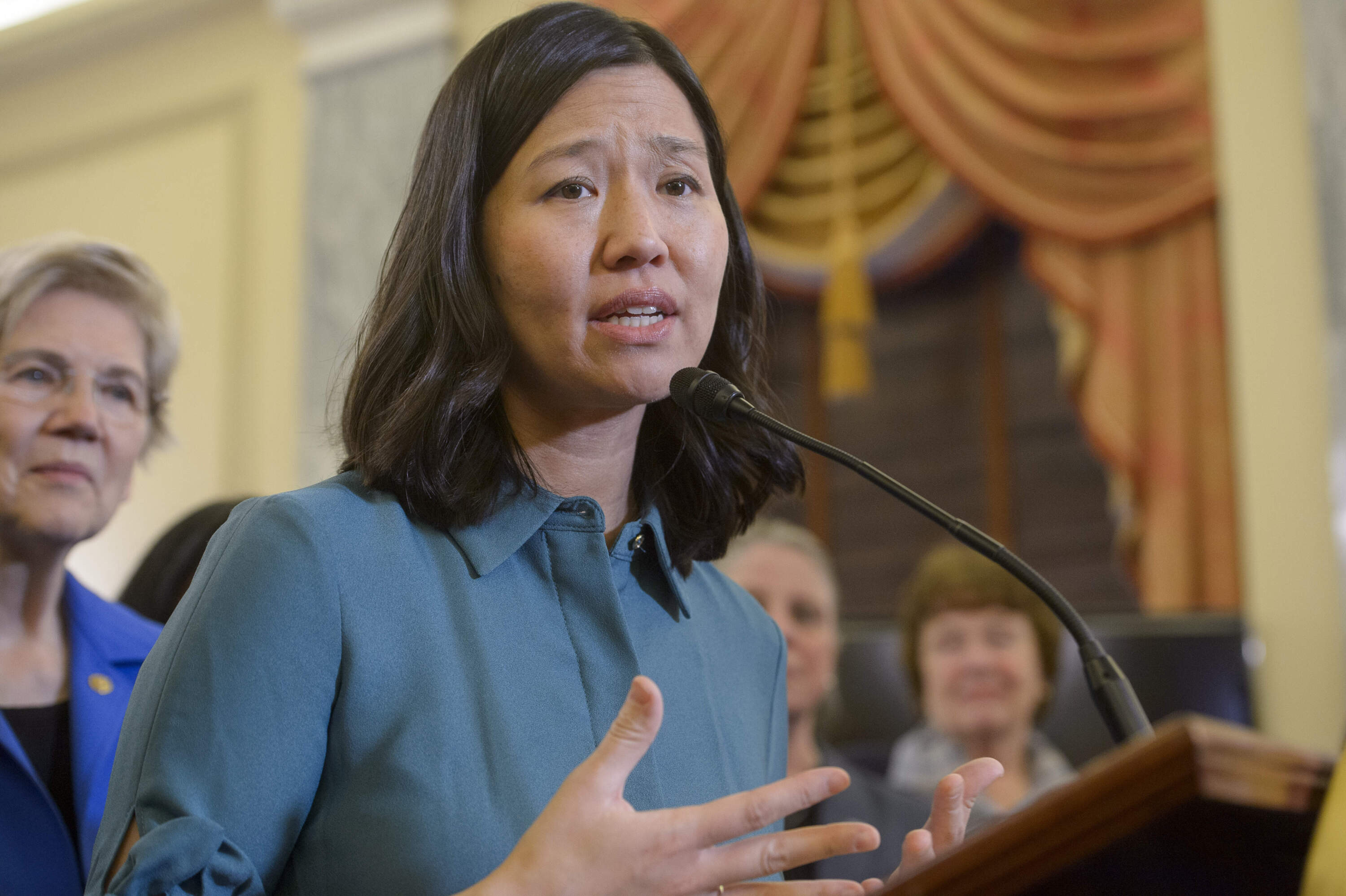 Boston Mayor Michelle Wu responds to questions from reporters during a Massachusetts Congressional Delegation press conference in March. (Rod Lamkey, Jr./AP)