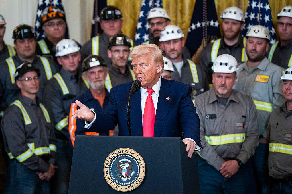 Coal miners listen as President Trump speaks about coal production during an executive order signing event in the East Room at the White House on Tuesday, April 8. (Jabin Botsford/The Washington Post via Getty Images)