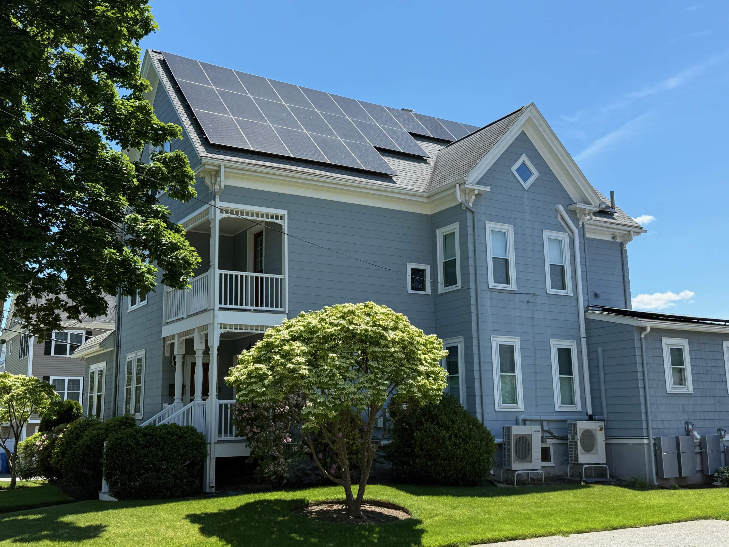 Solar panels on a home in Waltham, Mass. (Miriam Wasser/WBUR)