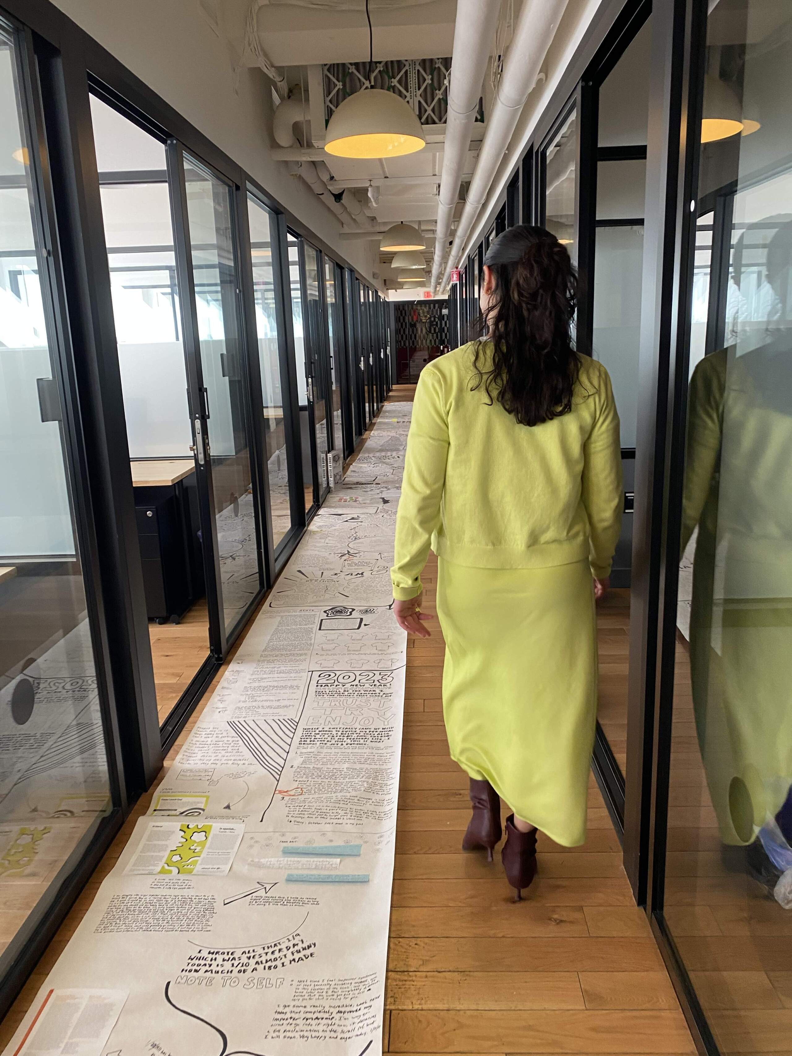 As a college student, Megan Burke started a "dream scroll" for her self-soothing, inclusive fashion brand concept. (Andrea Shea/WBUR)