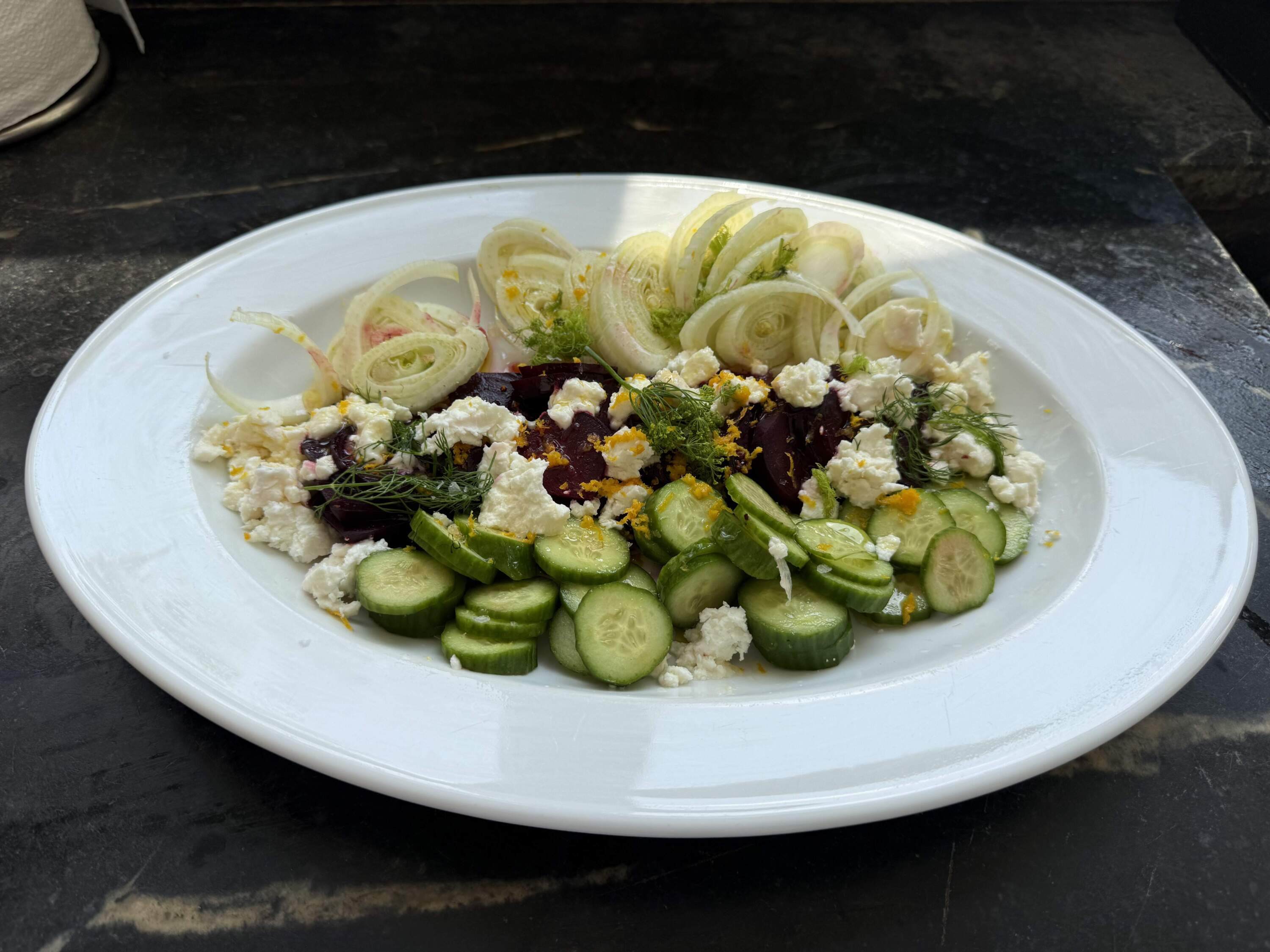 Roasted beets with fennel, cucumbers and greens with orange vinaigrette. (Kathy Gunst/Here & Now)
