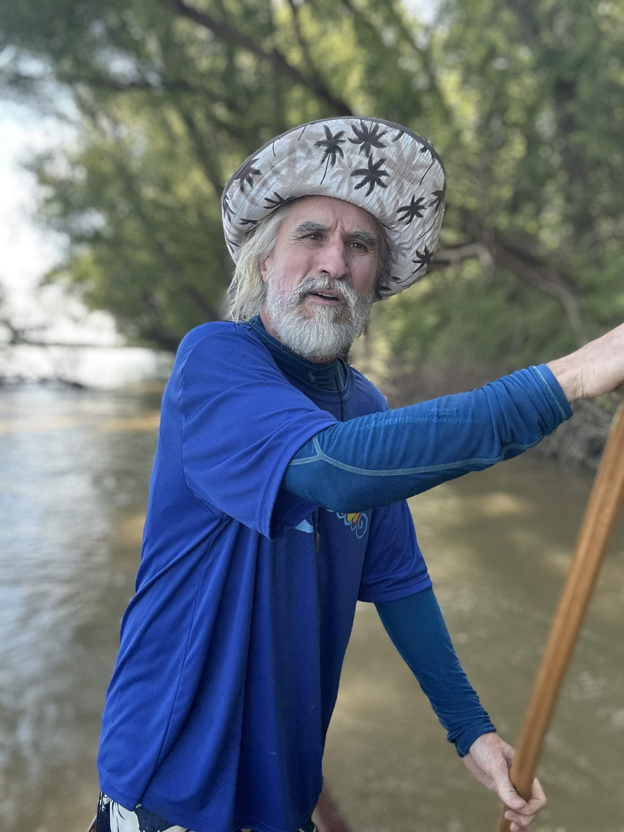 John Ruskey paddles a canoe down the Mississippi River, which he calls a "creative force." (Peter O'Dowd/Here &amp; Now)