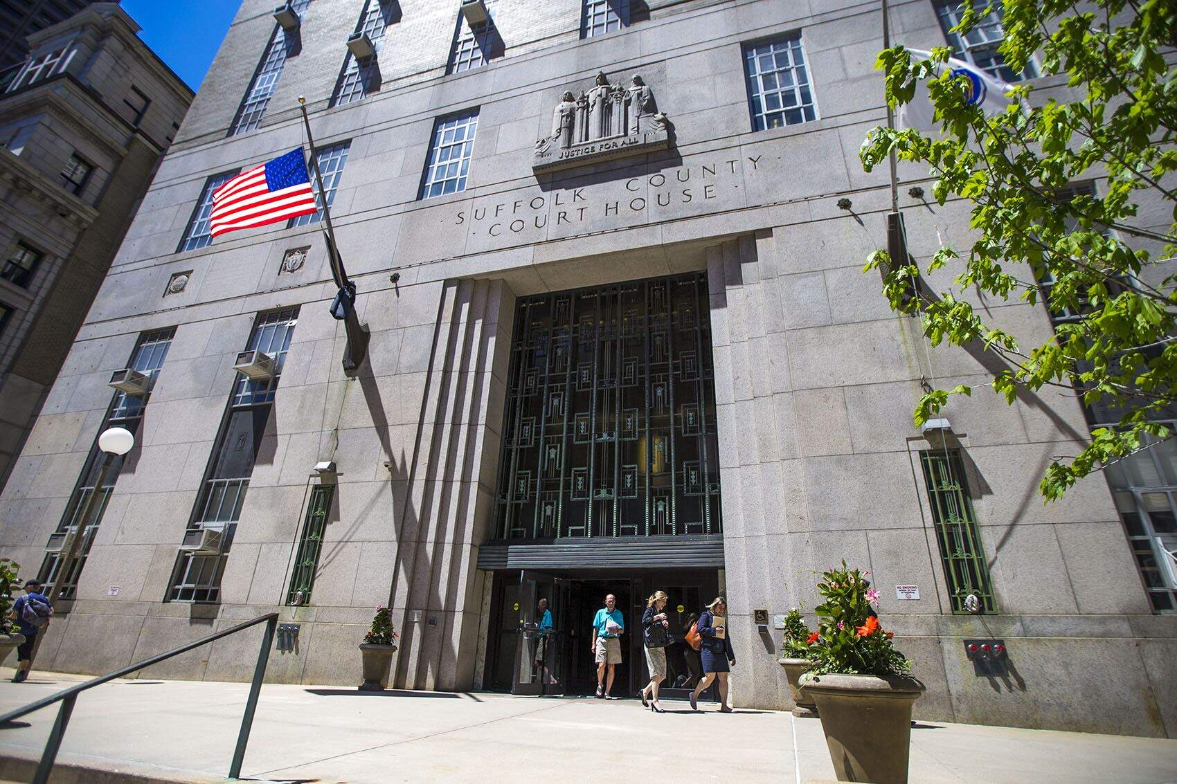 People exiting the Suffolk County Courthouse in 2018