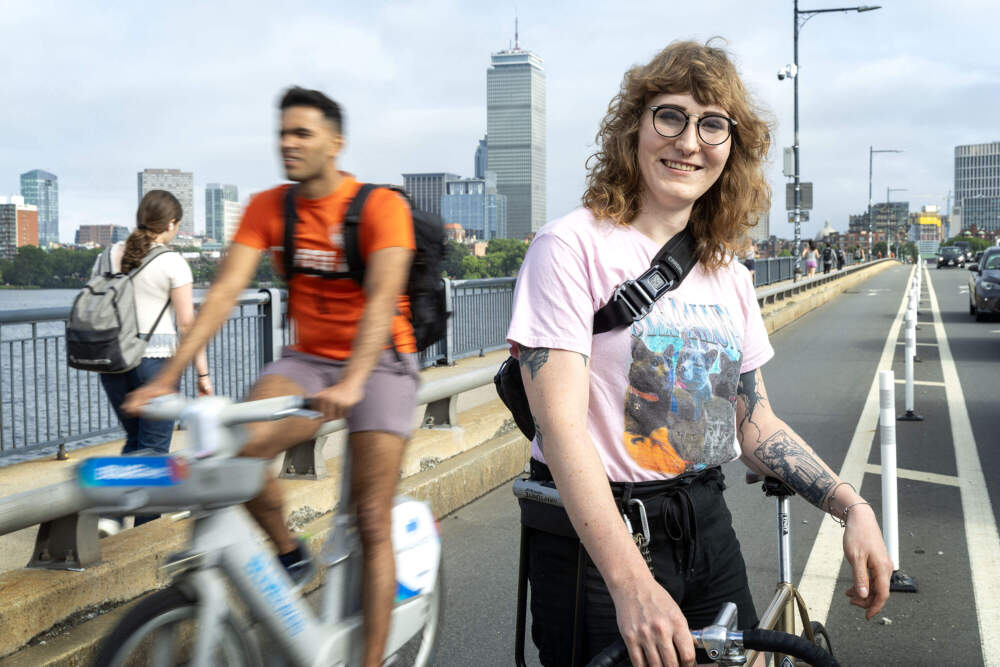 Mandy Wilkens of the Boston Cyclists Union on Massachusetts Ave. bridge across the Charles River. (Robin Lubbock/WBUR)