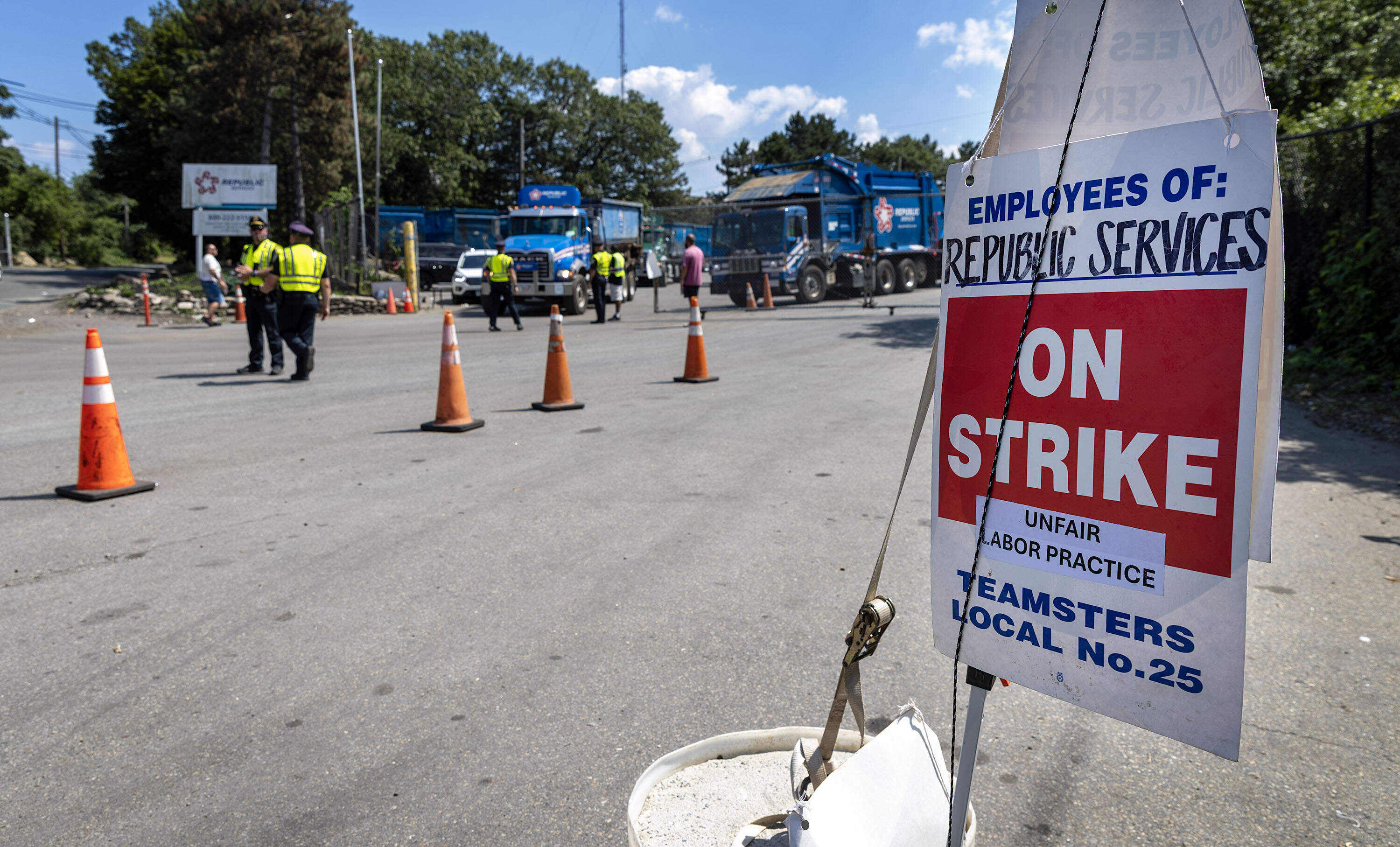 Striking Teamsters at a Republic Services facility in Peabody in July. (Robin Lubbock/WBUR)