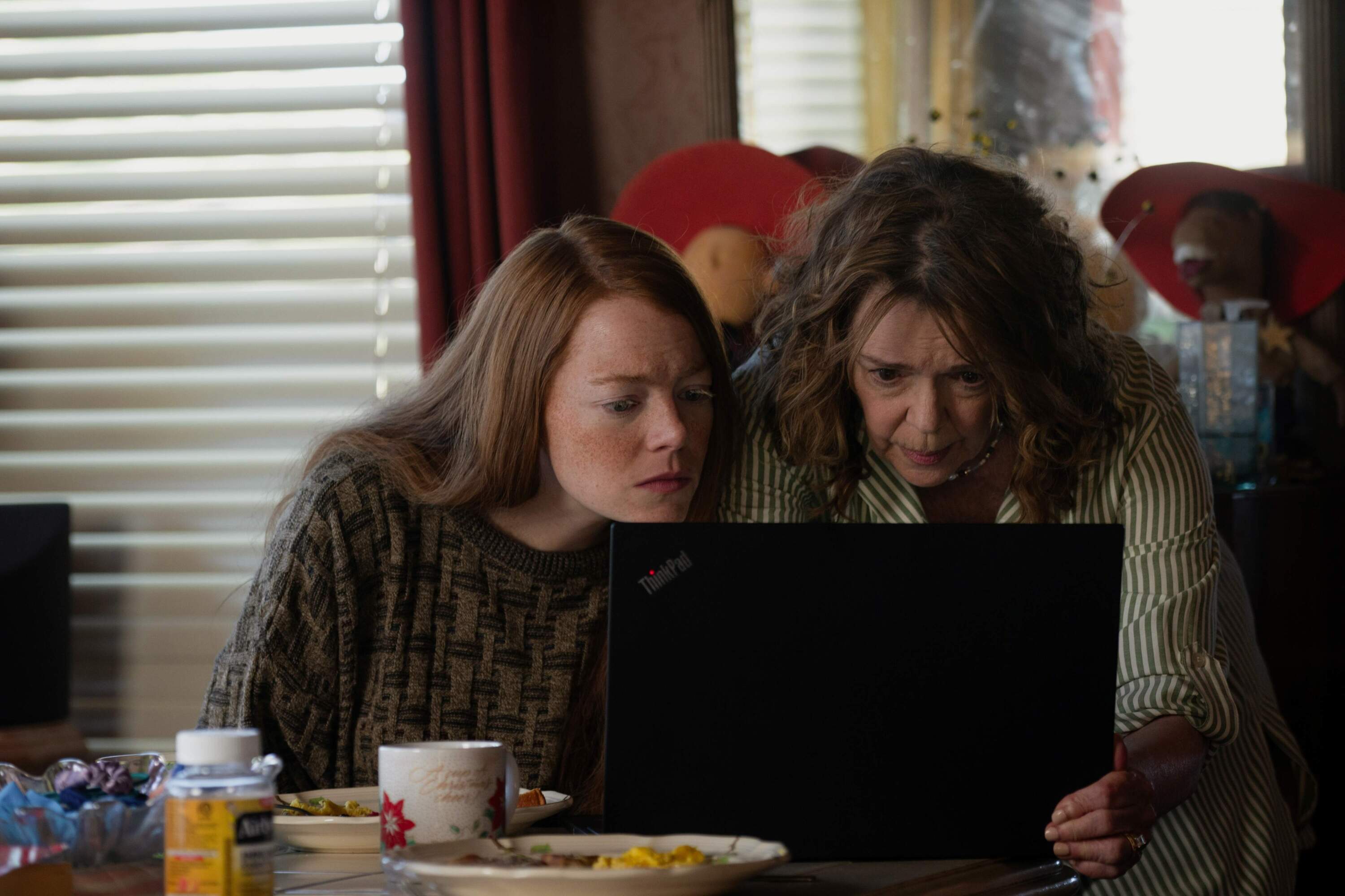 From left, Emma Stone and Deirdre O’Connell in writer-director Ari Aster's "Eddington." (Courtesy Richard Foreman/A24)