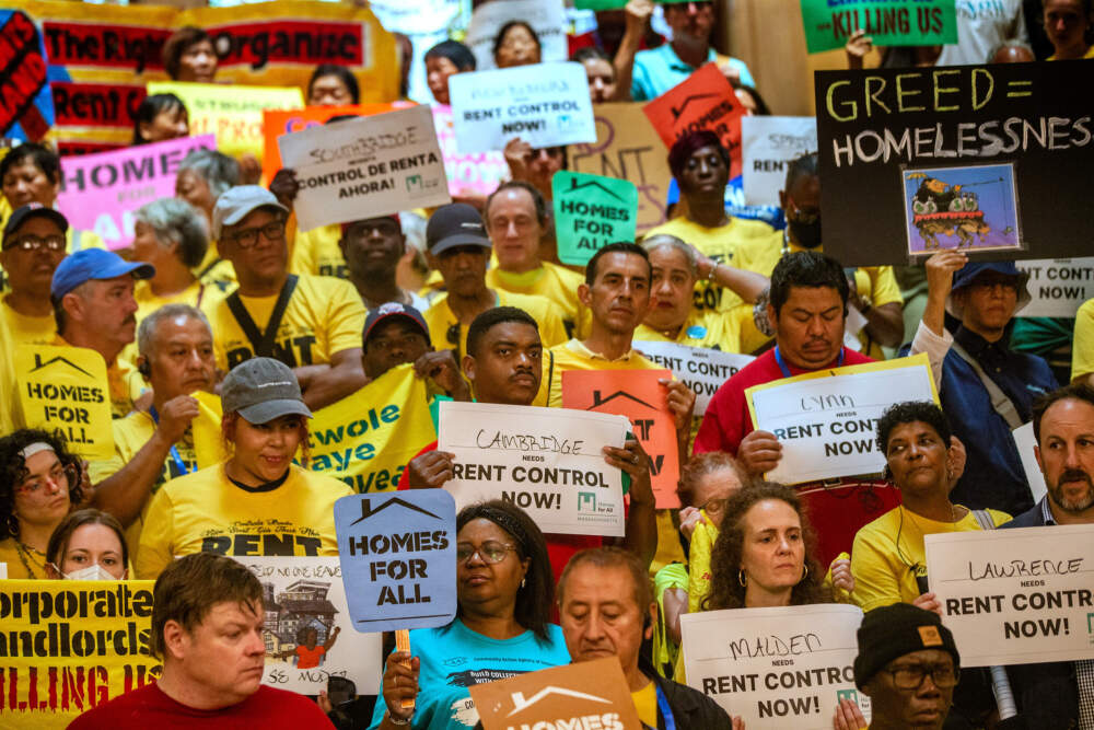 About two hundred people turned out for a rally at the state house supporting rent control. (Jesse Costa/WBUR)