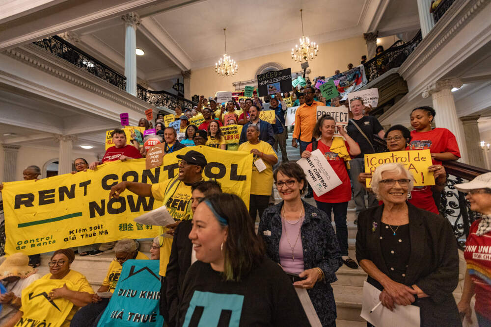 About two hundred people turned out for a rally at the State House supporting rent control. (Jesse Costa/WBUR)